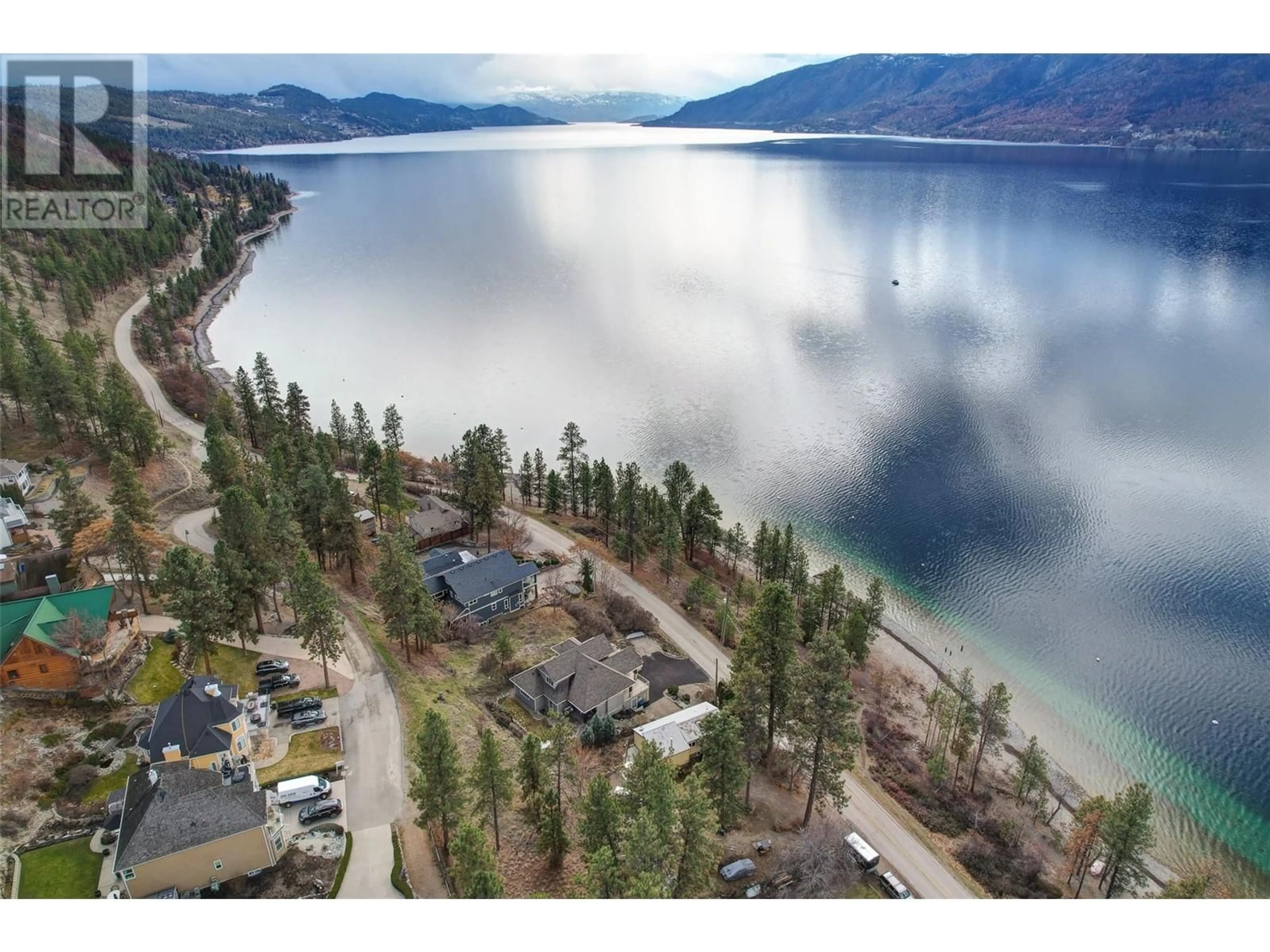 A pic from outside/outdoor area/front of a property/back of a property/a pic from drone, water/lake/river/ocean view for 10627 OKANAGAN CENTRE ROAD WEST, Lake Country British Columbia V4V2H8