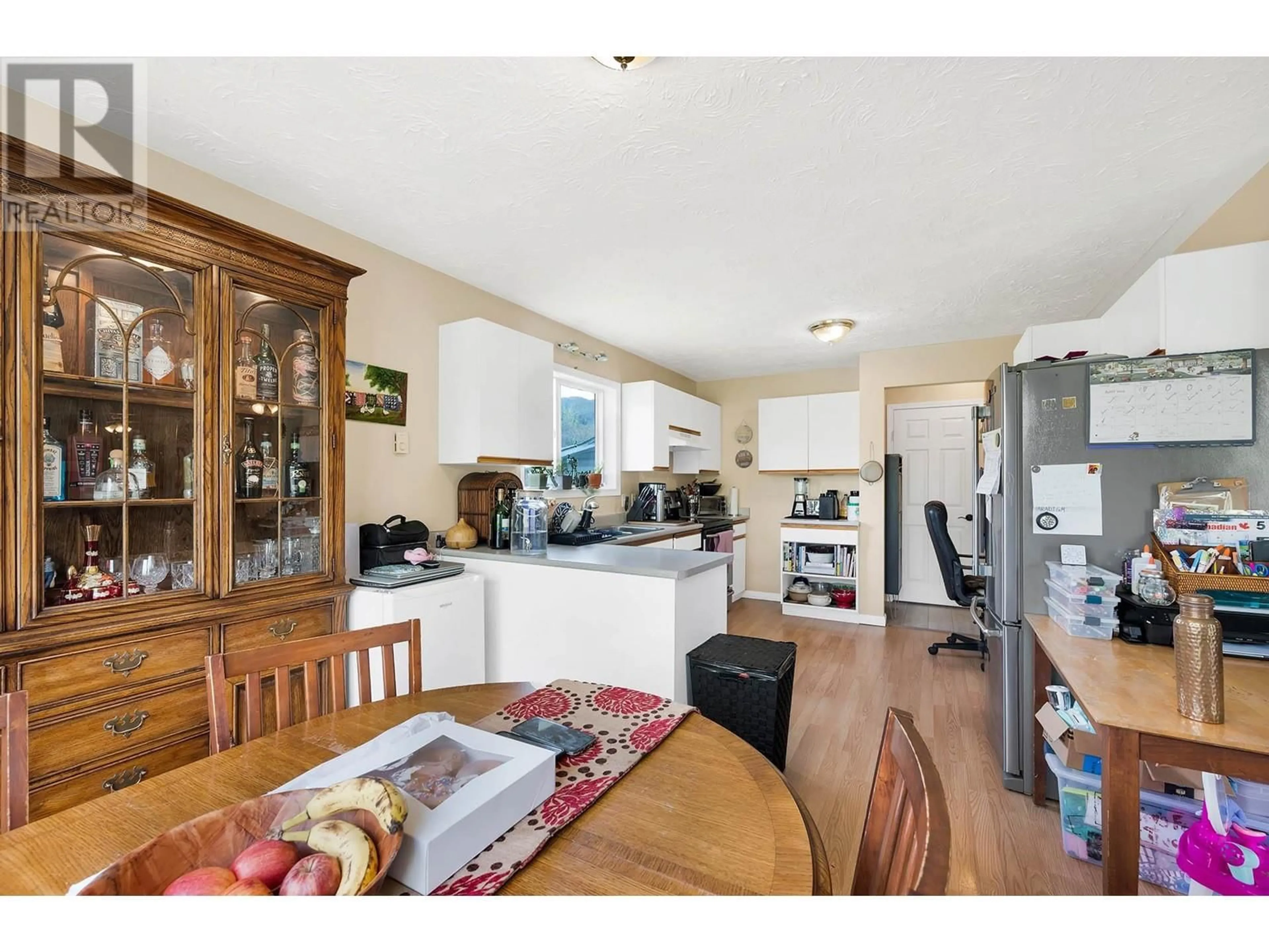 Open concept kitchen, wood/laminate floor for 3652 HART ROAD, Barriere British Columbia V0E1E0