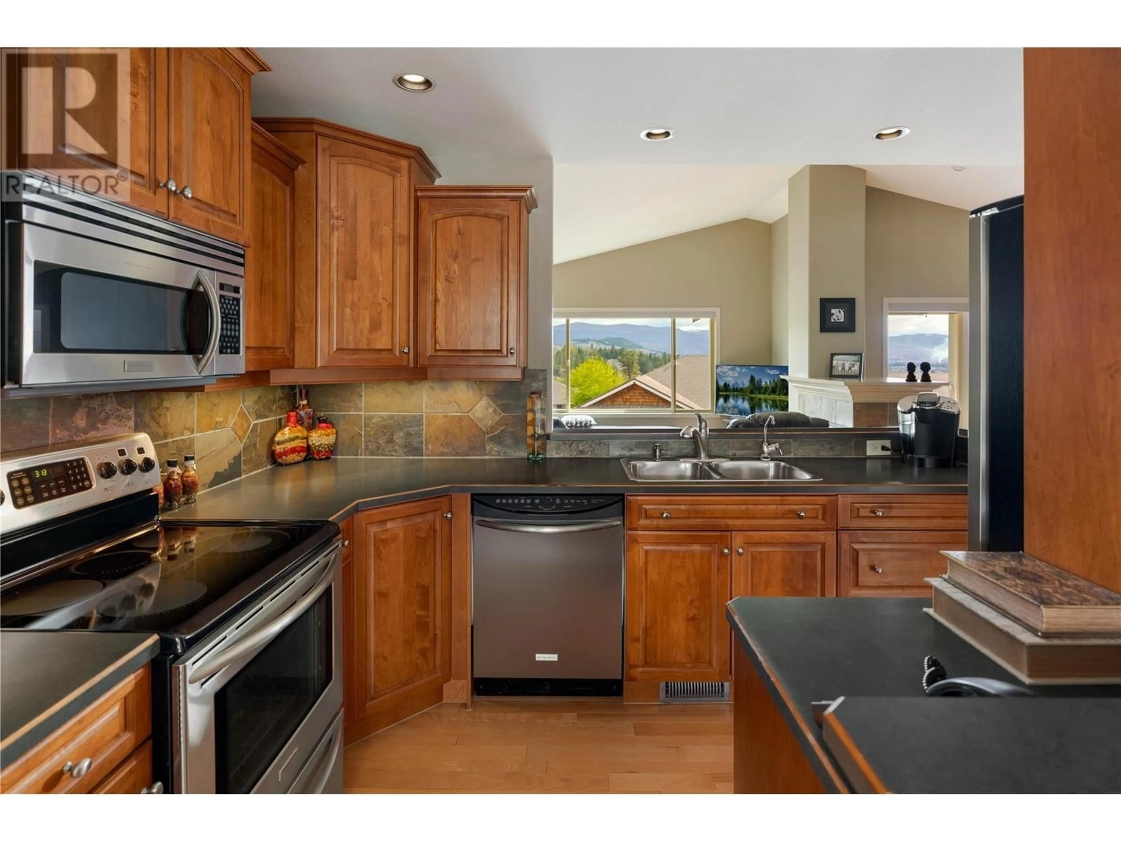 Open concept kitchen, ceramic/tile floor for 5165 SANDHILLS DRIVE, Kelowna British Columbia V1X7Y7