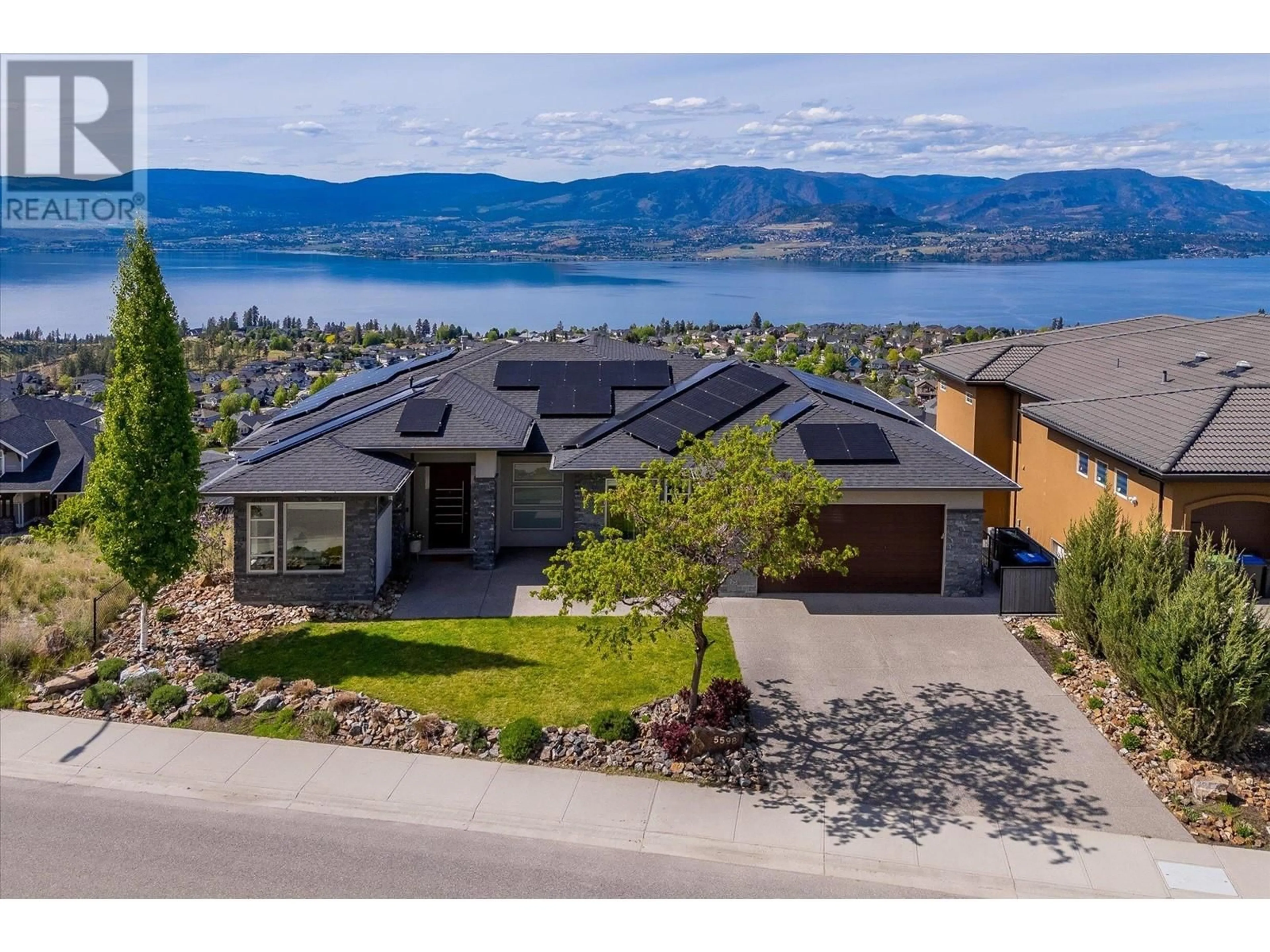 A pic from outside/outdoor area/front of a property/back of a property/a pic from drone, mountain view for 5598 UPPER MISSION DRIVE, Kelowna British Columbia V1W5M4