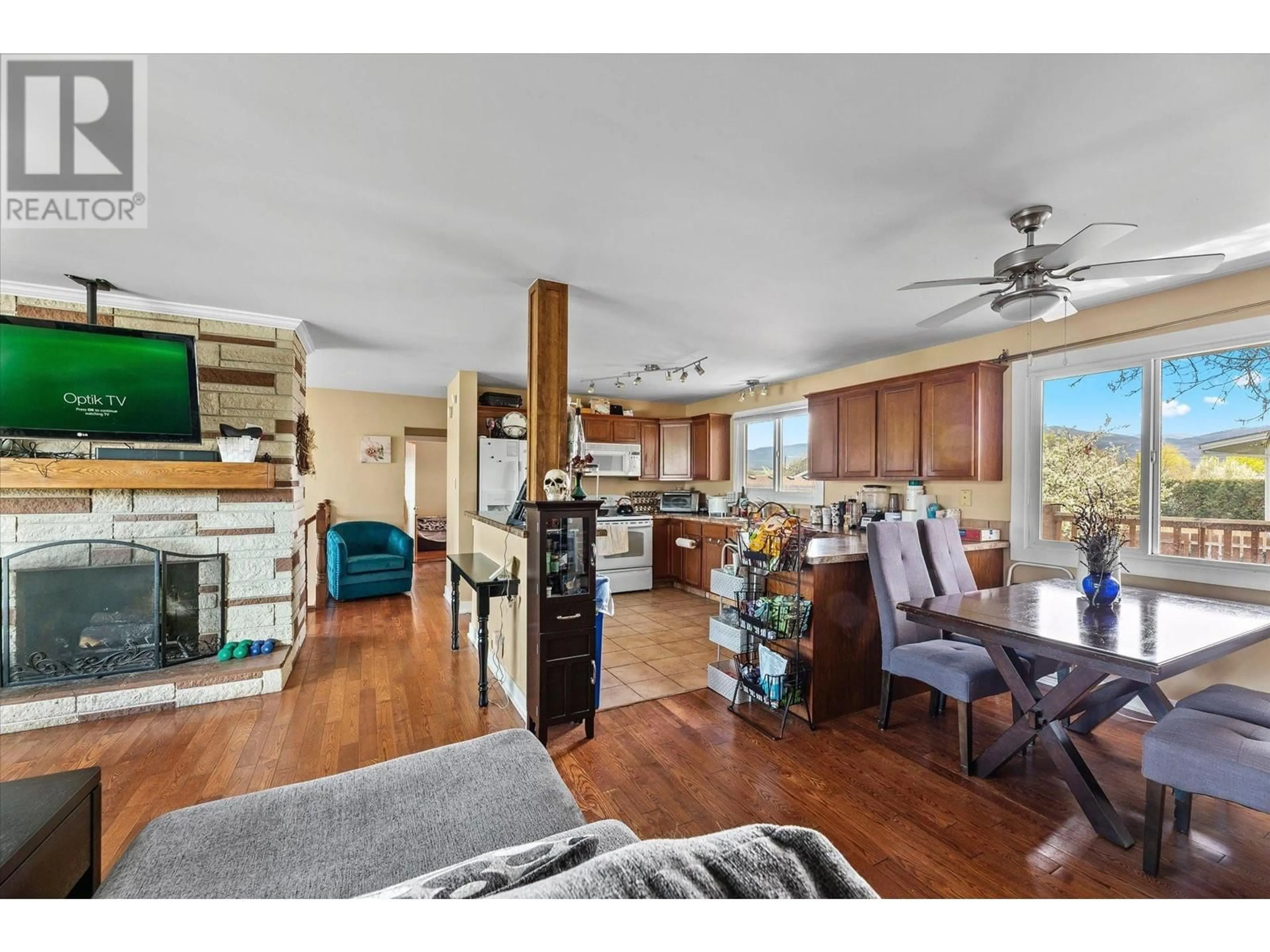 Open concept kitchen, wood/laminate floor for 1301 MCBRIDE ROAD, Kelowna British Columbia V1Y4A5