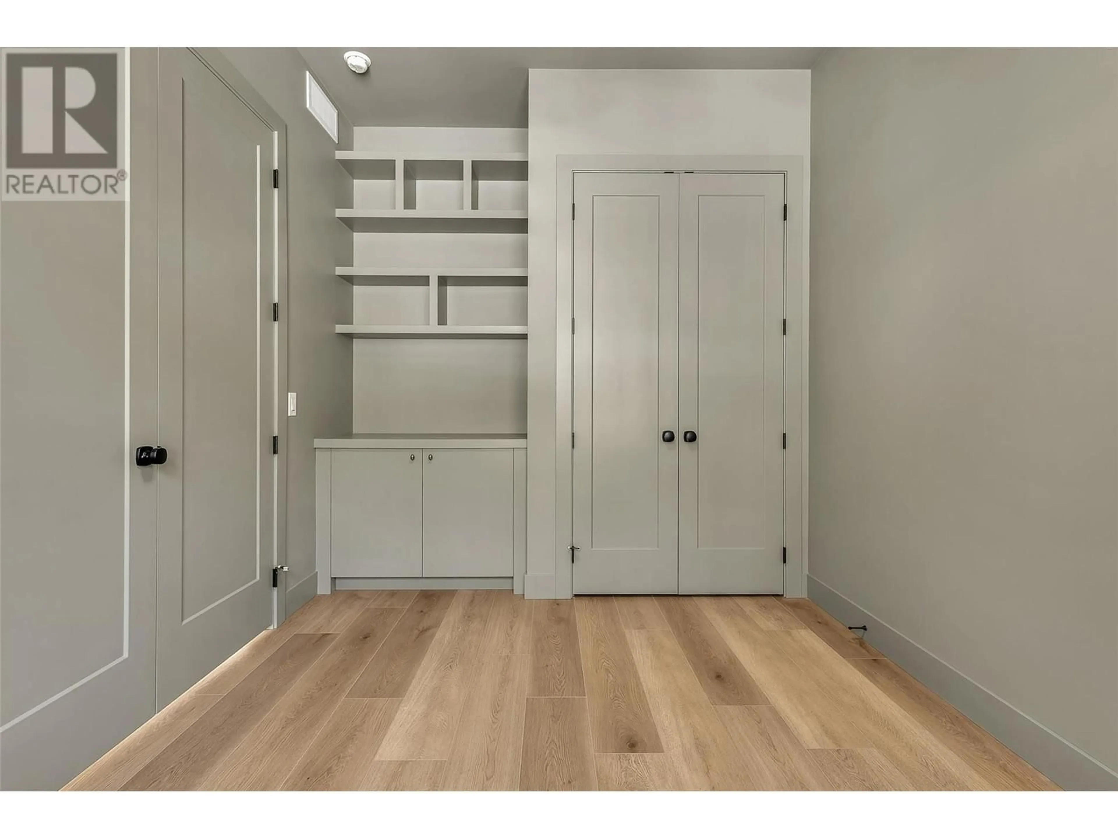 Storage room or clothes room or walk-in closet for 1439 WHISTLING PINE PLACE, Kelowna British Columbia V1V2C6