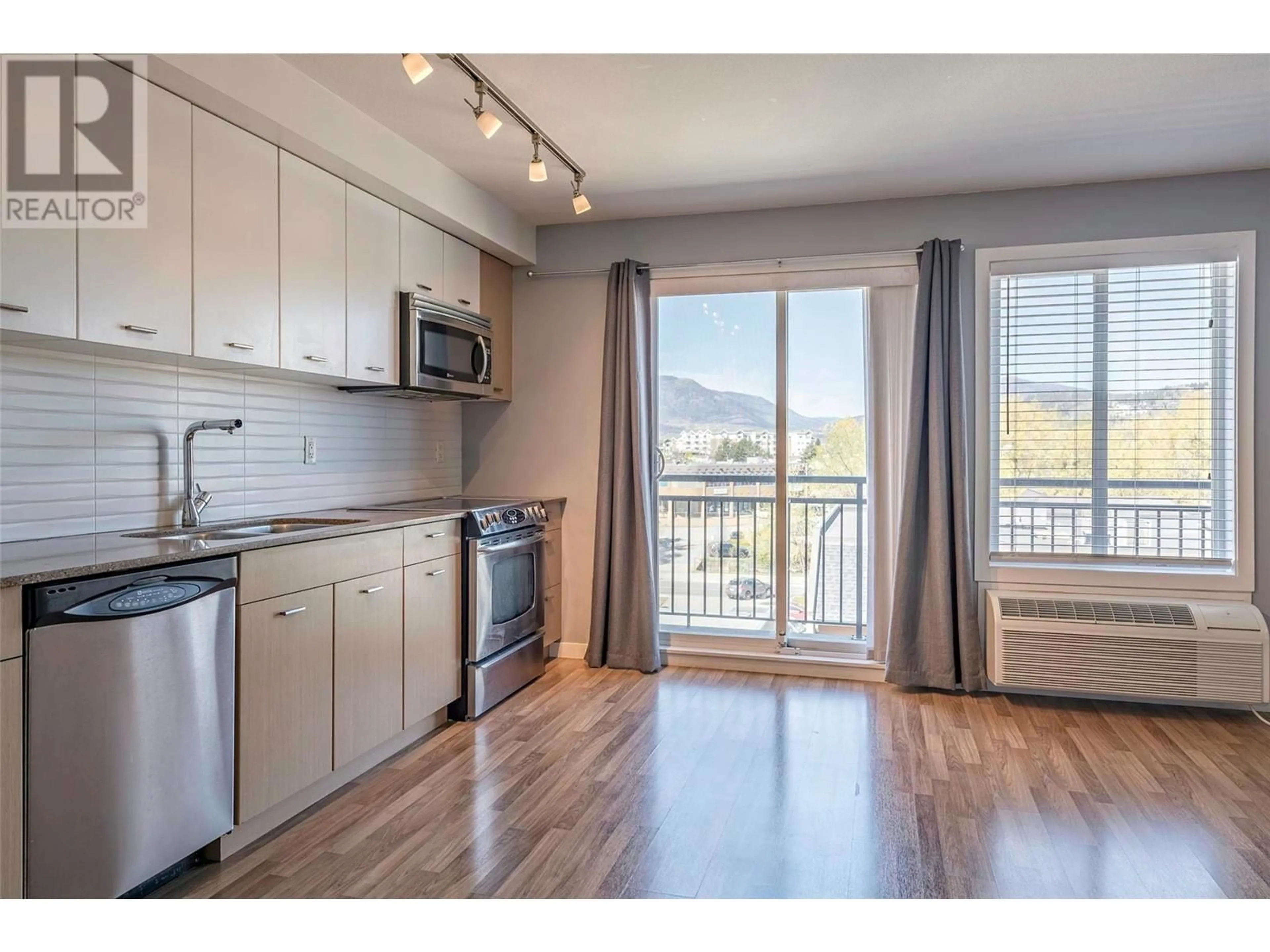 Standard kitchen, wood/laminate floor for 417 - 1550 DICKSON AVENUE, Kelowna British Columbia V1Y9Y8