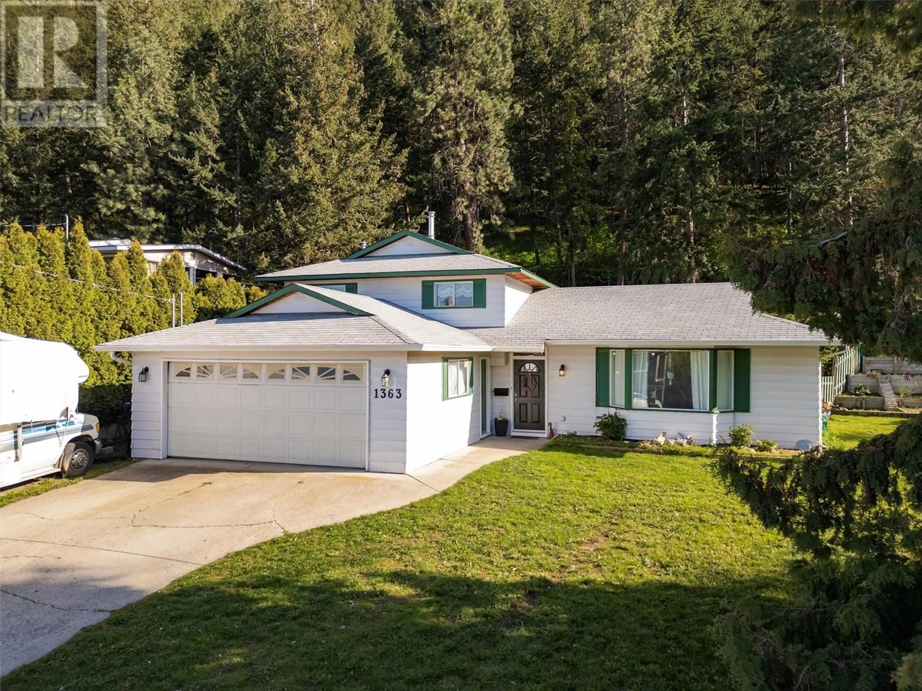 Home with vinyl exterior material, street for 1363 PONDEROSA ROAD, West Kelowna British Columbia V1Z1M8