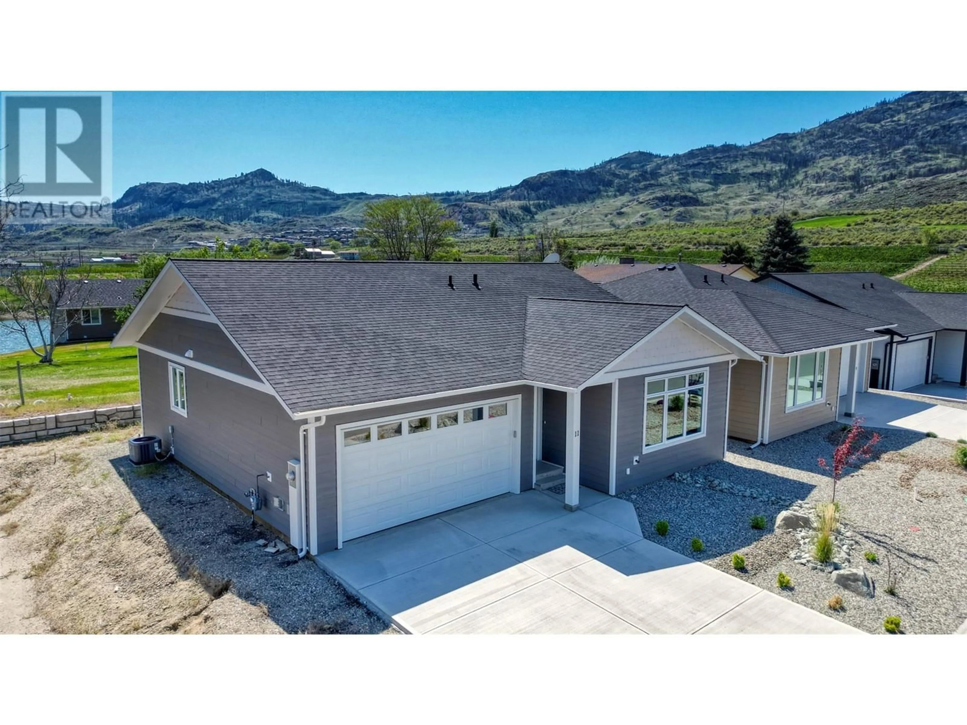 A pic from outside/outdoor area/front of a property/back of a property/a pic from drone, mountain view for 11 WOOD DUCK WAY, Osoyoos British Columbia V0H1V5