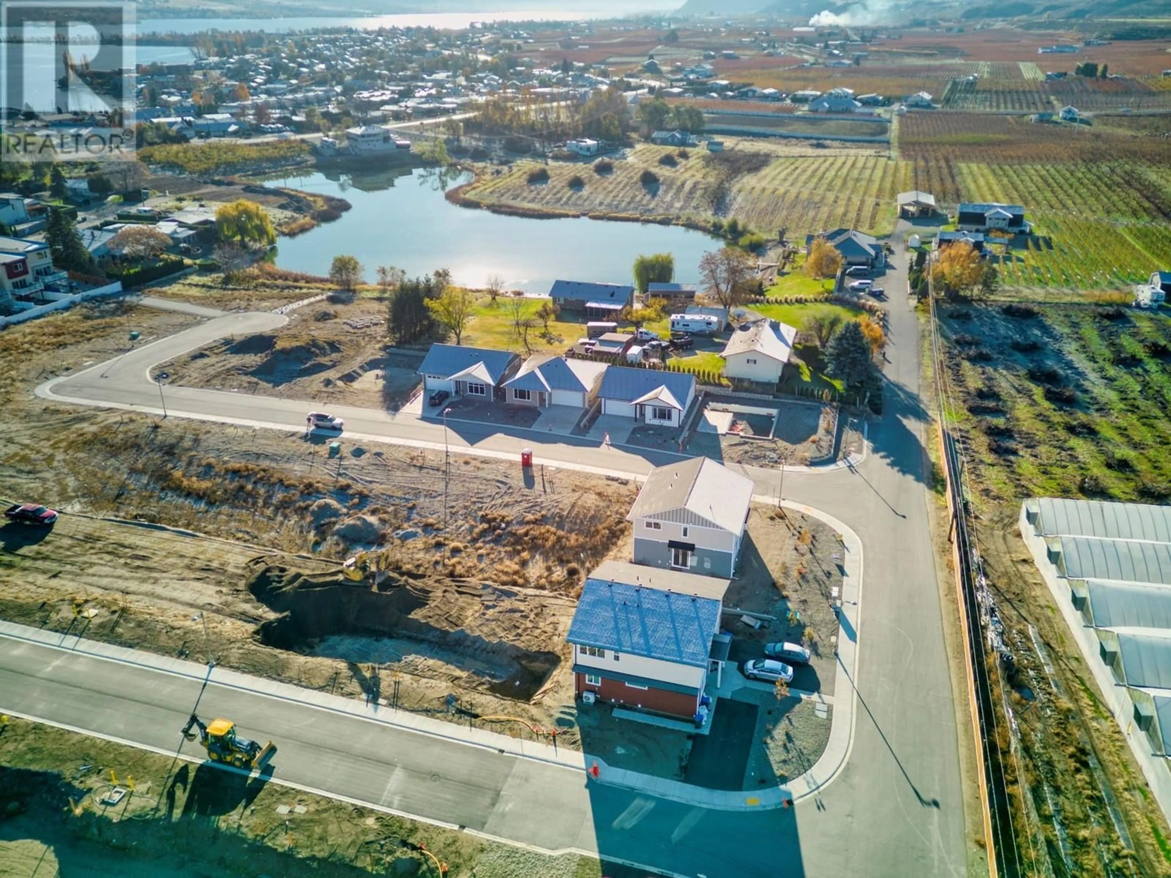 A pic from outside/outdoor area/front of a property/back of a property/a pic from drone, water/lake/river/ocean view for 11 WOOD DUCK WAY, Osoyoos British Columbia V0H1V5