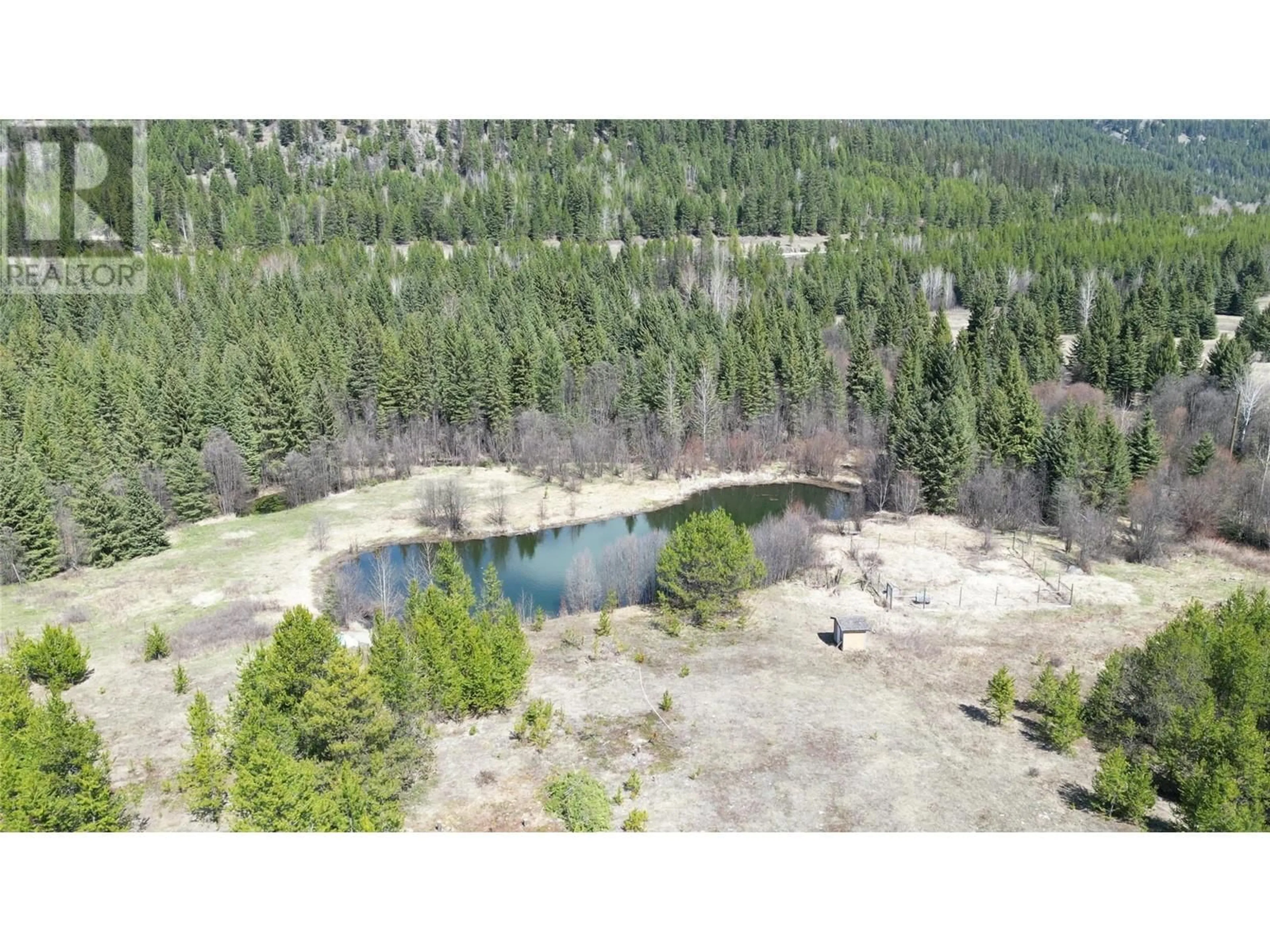 A pic from outside/outdoor area/front of a property/back of a property/a pic from drone, forest/trees view for 12155 HIGHWAY 3 HIGHWAY, Greenwood British Columbia V0H1J0