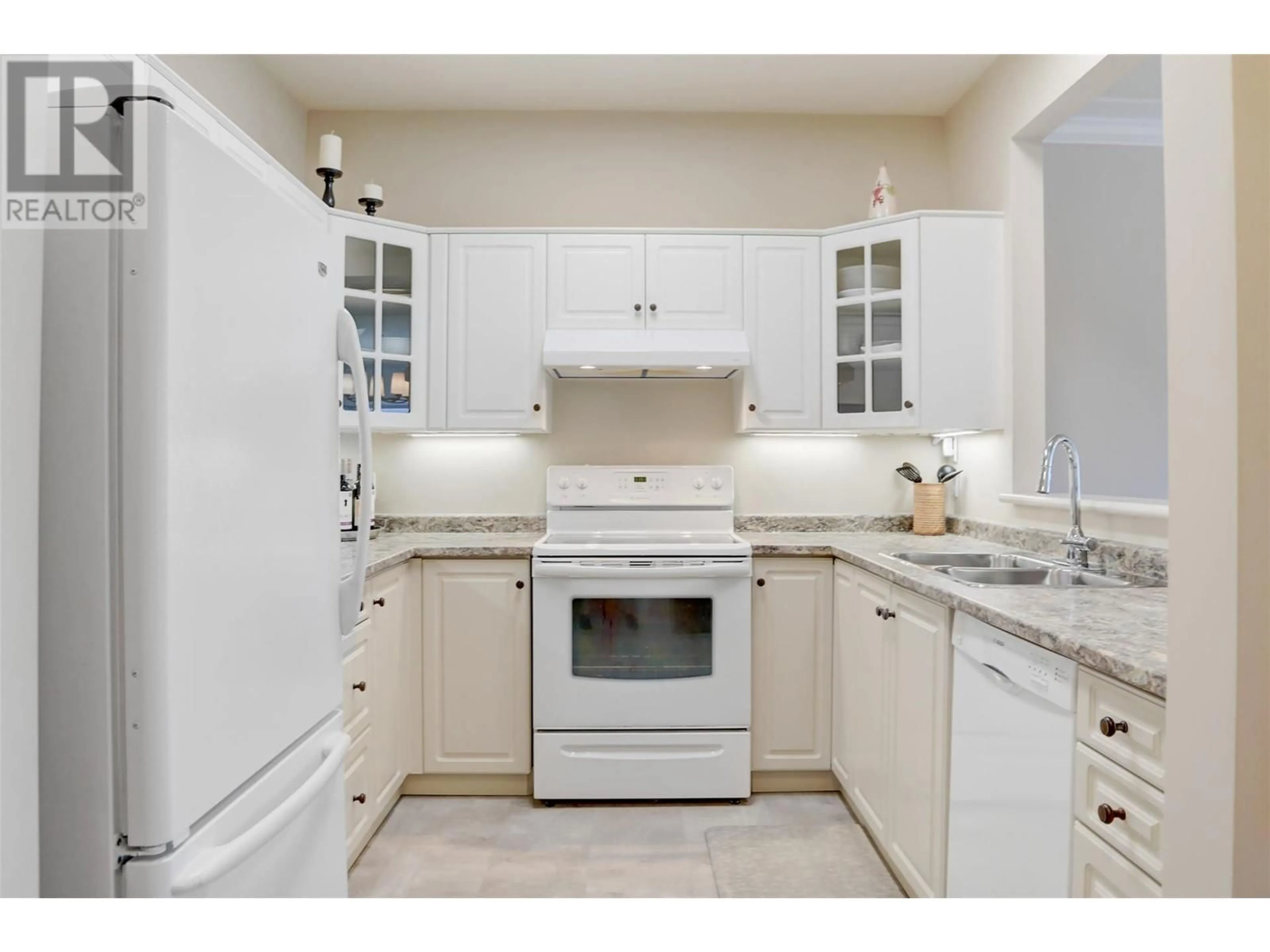 Standard kitchen, ceramic/tile floor for 207 - 877 K.L.O. ROAD, Kelowna British Columbia V1Y9R1