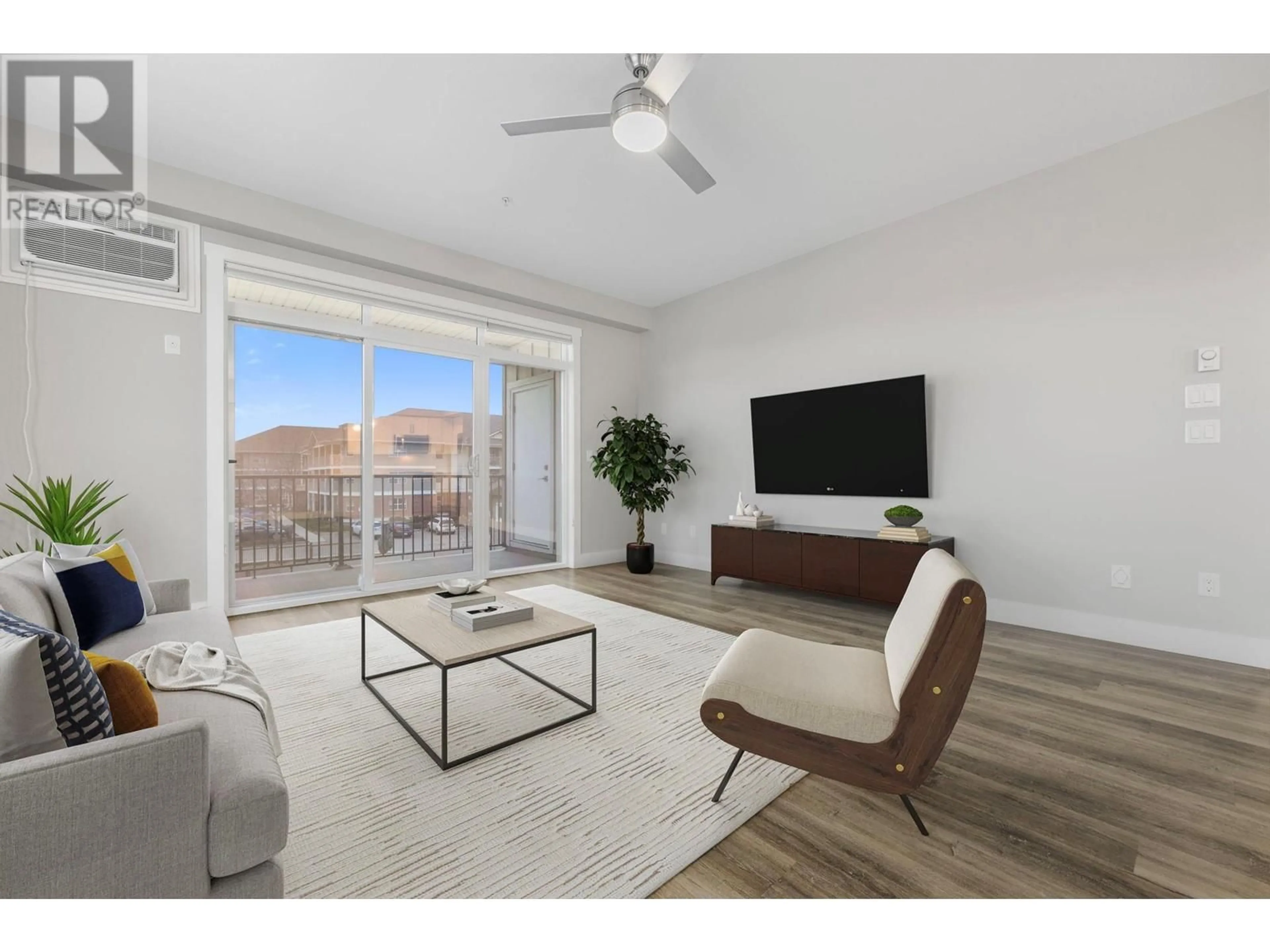 Living room with furniture, unknown for 214 - 3090 BURTCH ROAD, Kelowna British Columbia V1W5G9