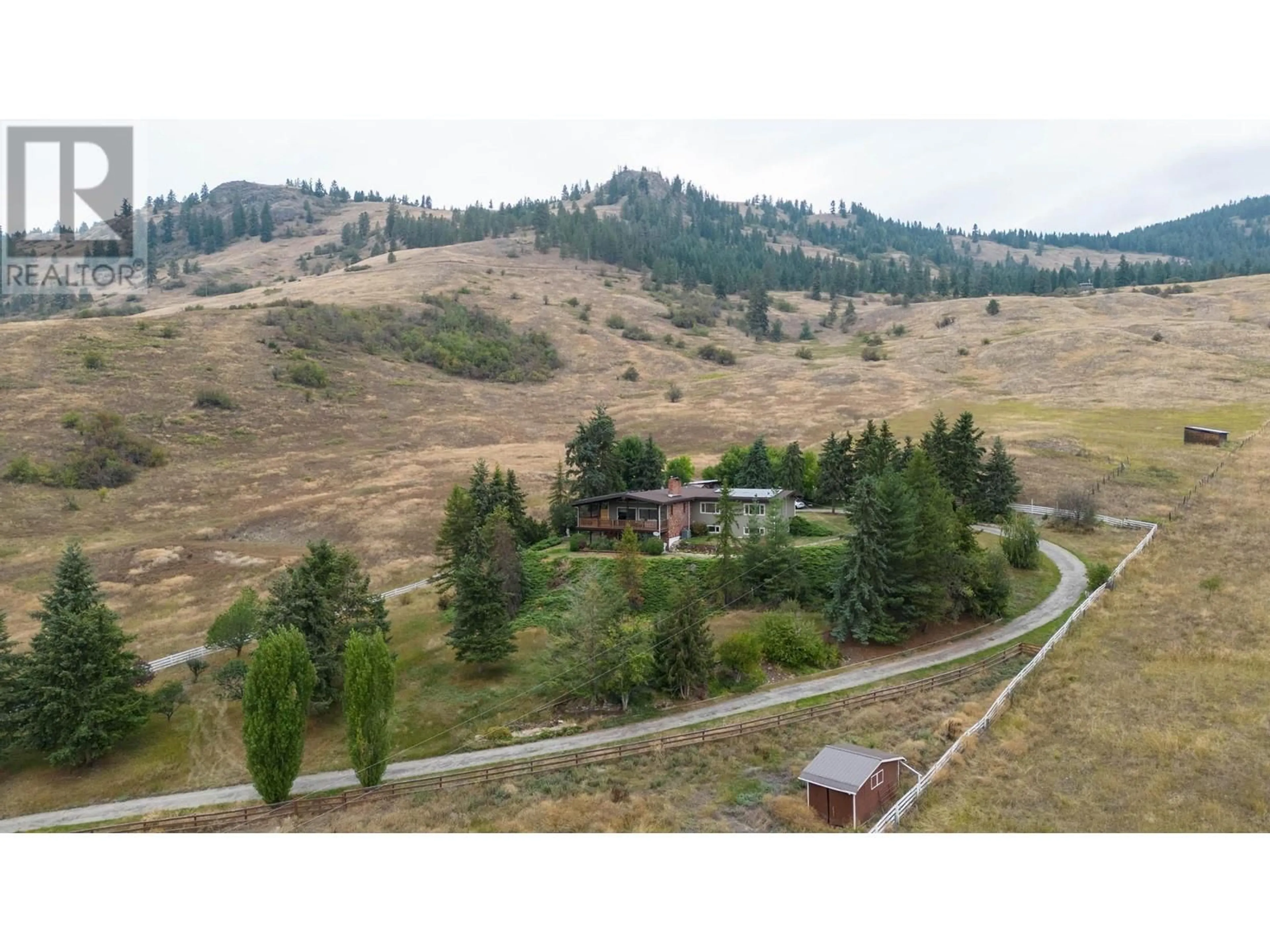 A pic from outside/outdoor area/front of a property/back of a property/a pic from drone, mountain view for 2545 6 HIGHWAY EAST, Lumby British Columbia V0E2G1