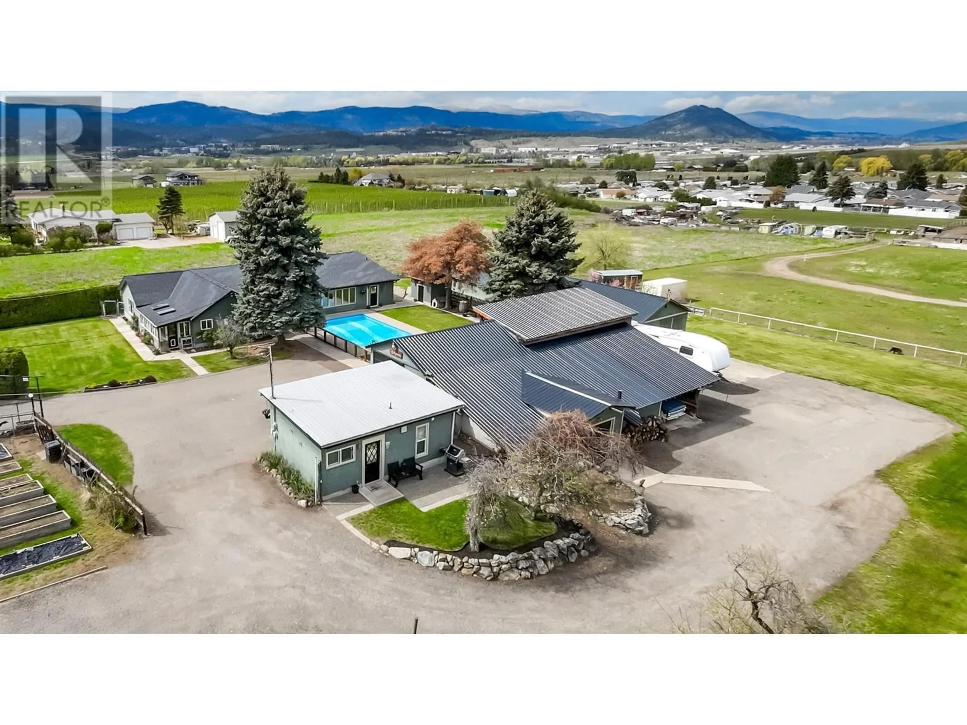 A pic from outside/outdoor area/front of a property/back of a property/a pic from drone, mountain view for 4660 SCOTTY CREEK ROAD, Kelowna British Columbia V1X6N2