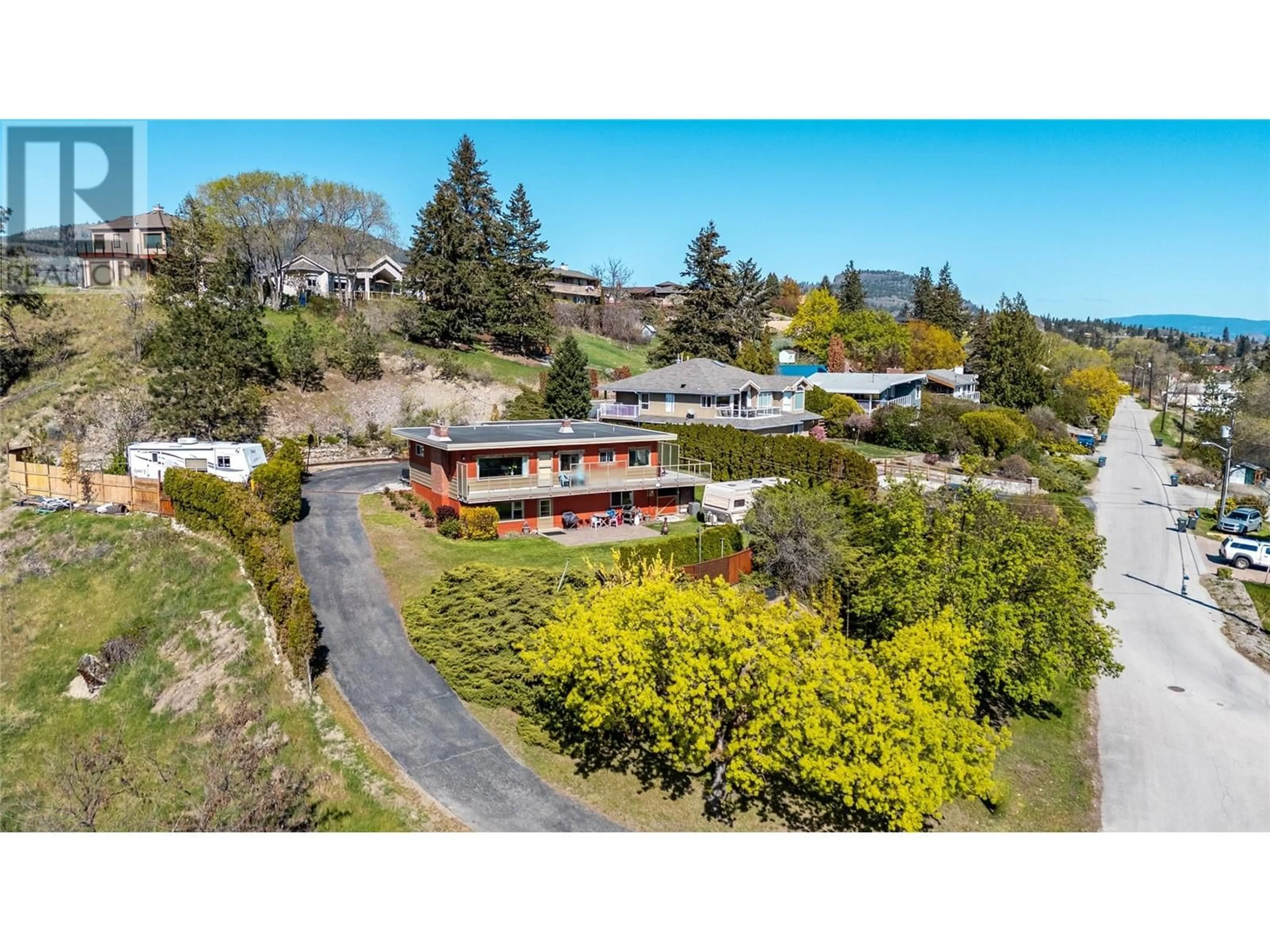 A pic from outside/outdoor area/front of a property/back of a property/a pic from drone, mountain view for 13006 BRISTOW ROAD, Summerland British Columbia V0H1Z1