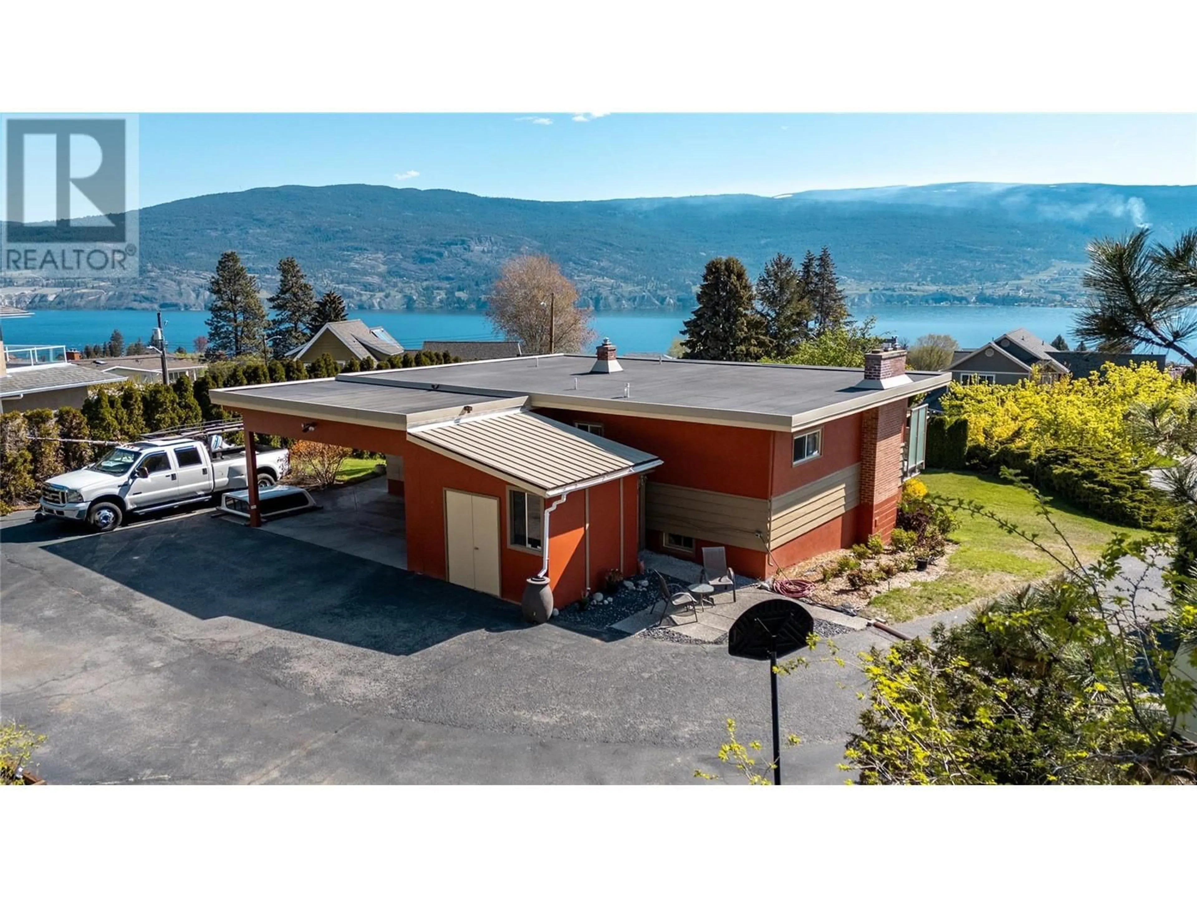 A pic from outside/outdoor area/front of a property/back of a property/a pic from drone, water/lake/river/ocean view for 13006 BRISTOW ROAD, Summerland British Columbia V0H1Z1
