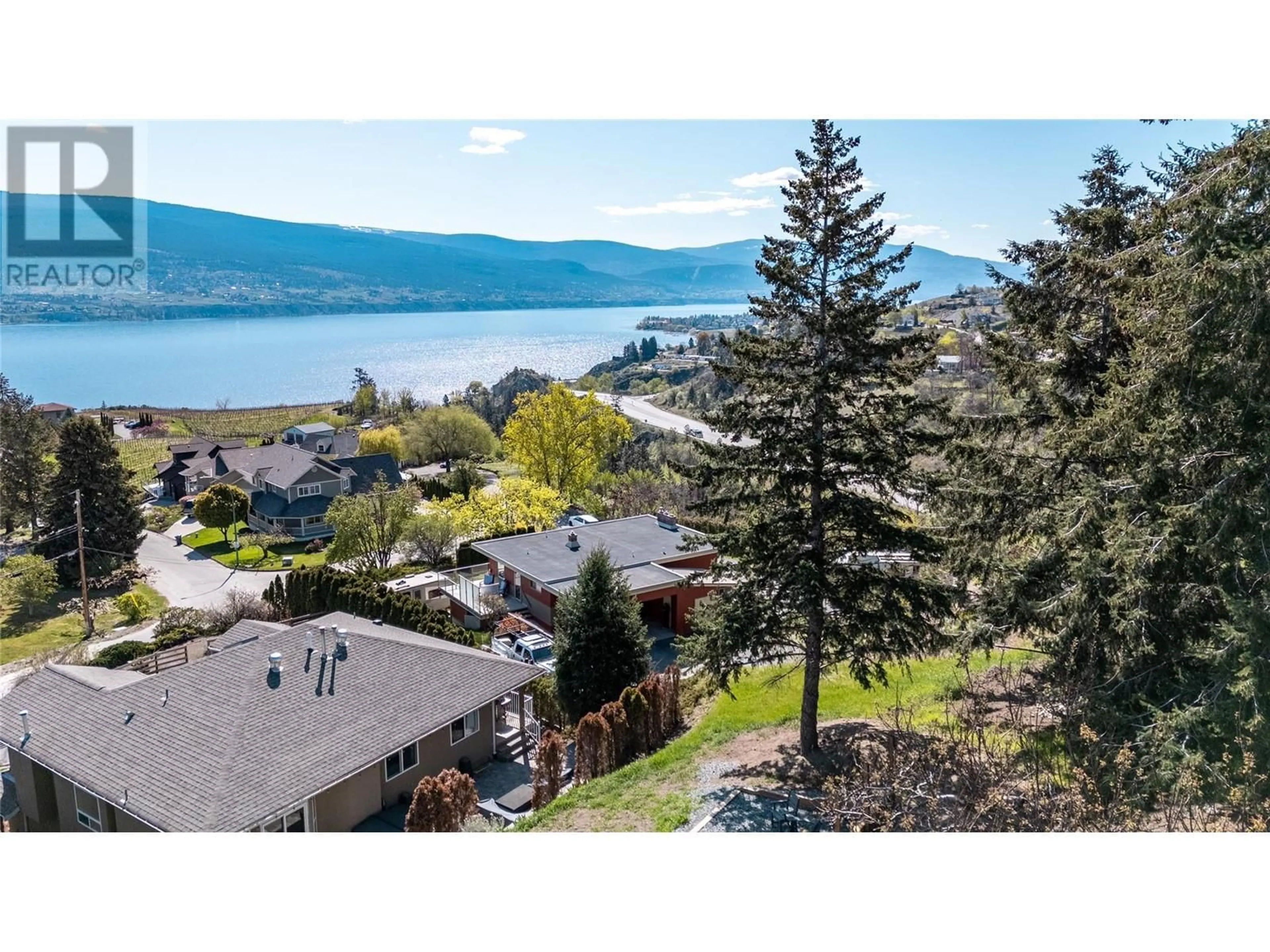 A pic from outside/outdoor area/front of a property/back of a property/a pic from drone, water/lake/river/ocean view for 13006 BRISTOW ROAD, Summerland British Columbia V0H1Z1