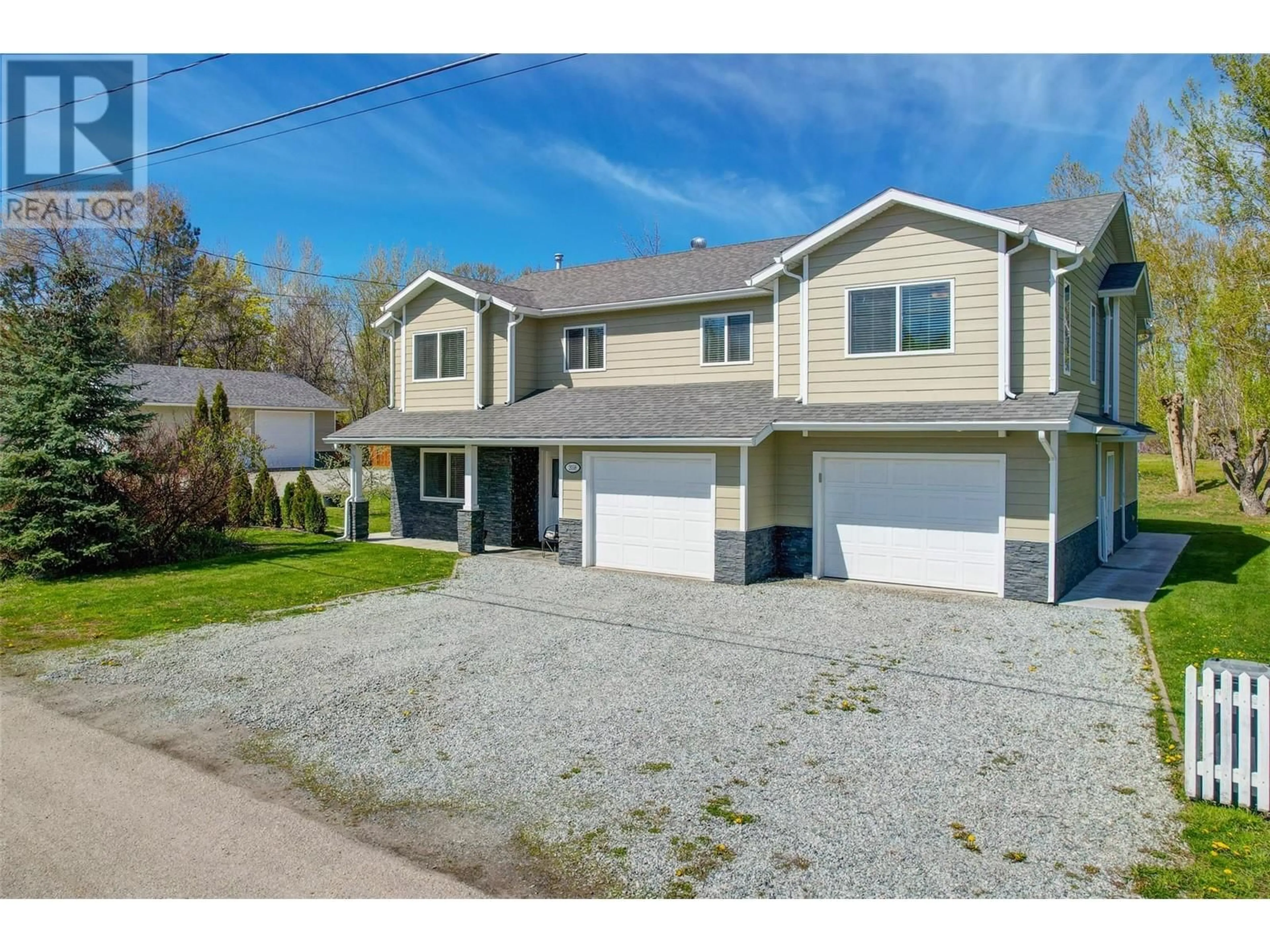 Home with vinyl exterior material, street for 2058 PARSONS ROAD, Kelowna British Columbia V1W2X1