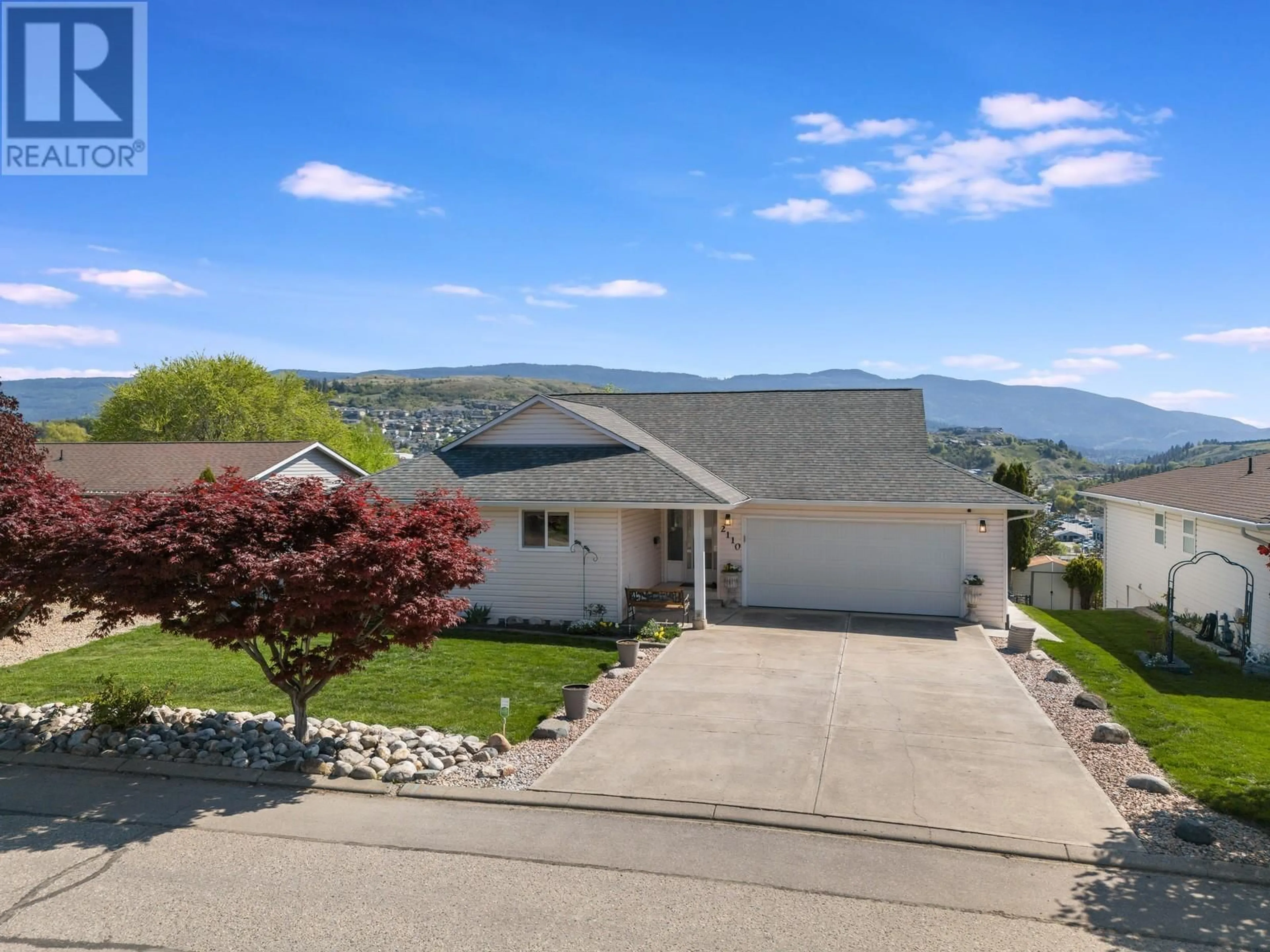 A pic from outside/outdoor area/front of a property/back of a property/a pic from drone, mountain view for 2110 21 AVENUE, Vernon British Columbia V1T8H6