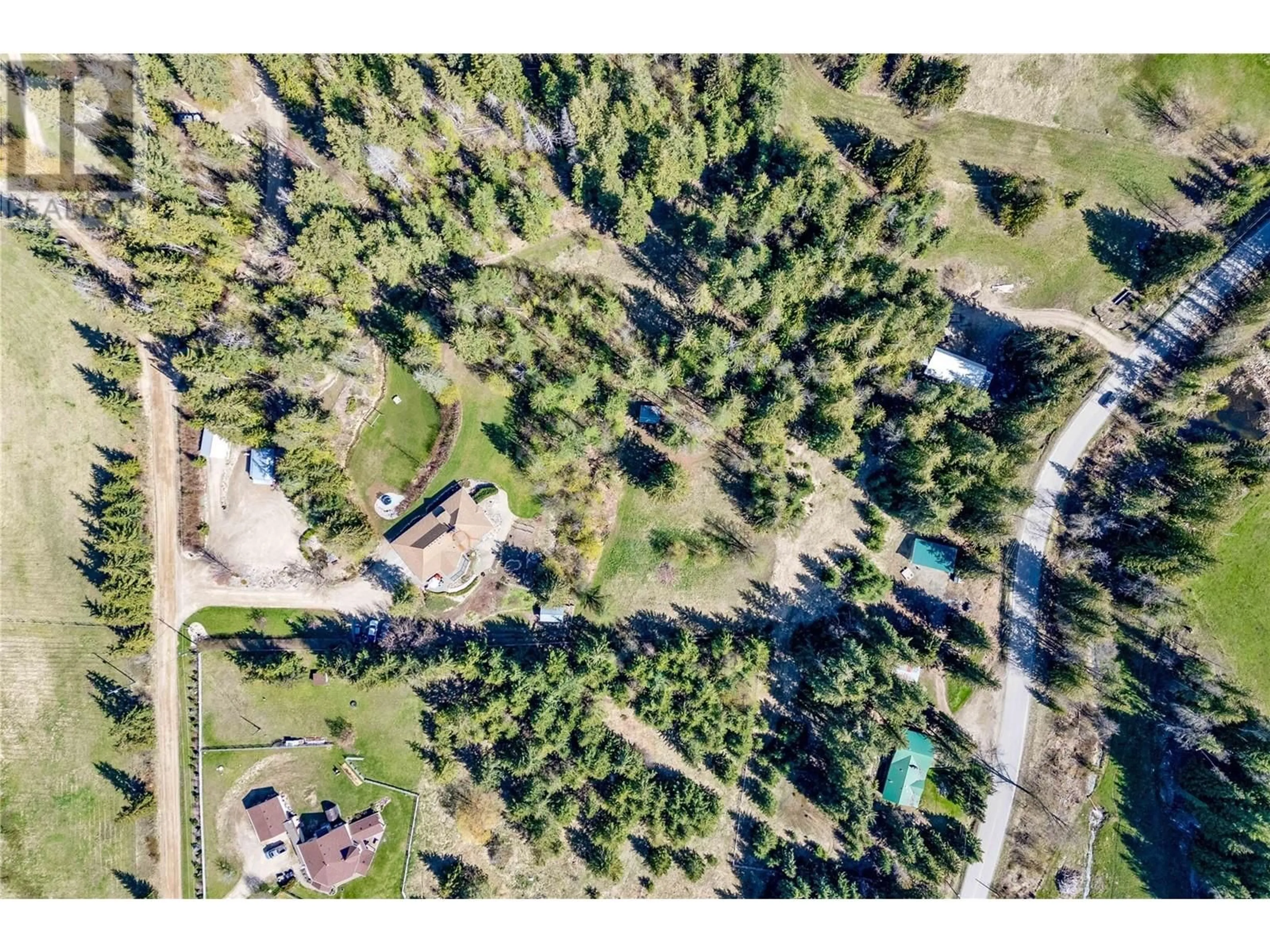A pic from outside/outdoor area/front of a property/back of a property/a pic from drone, forest/trees view for 69 SCHINDLER ROAD, Salmon Arm British Columbia V1E2X9