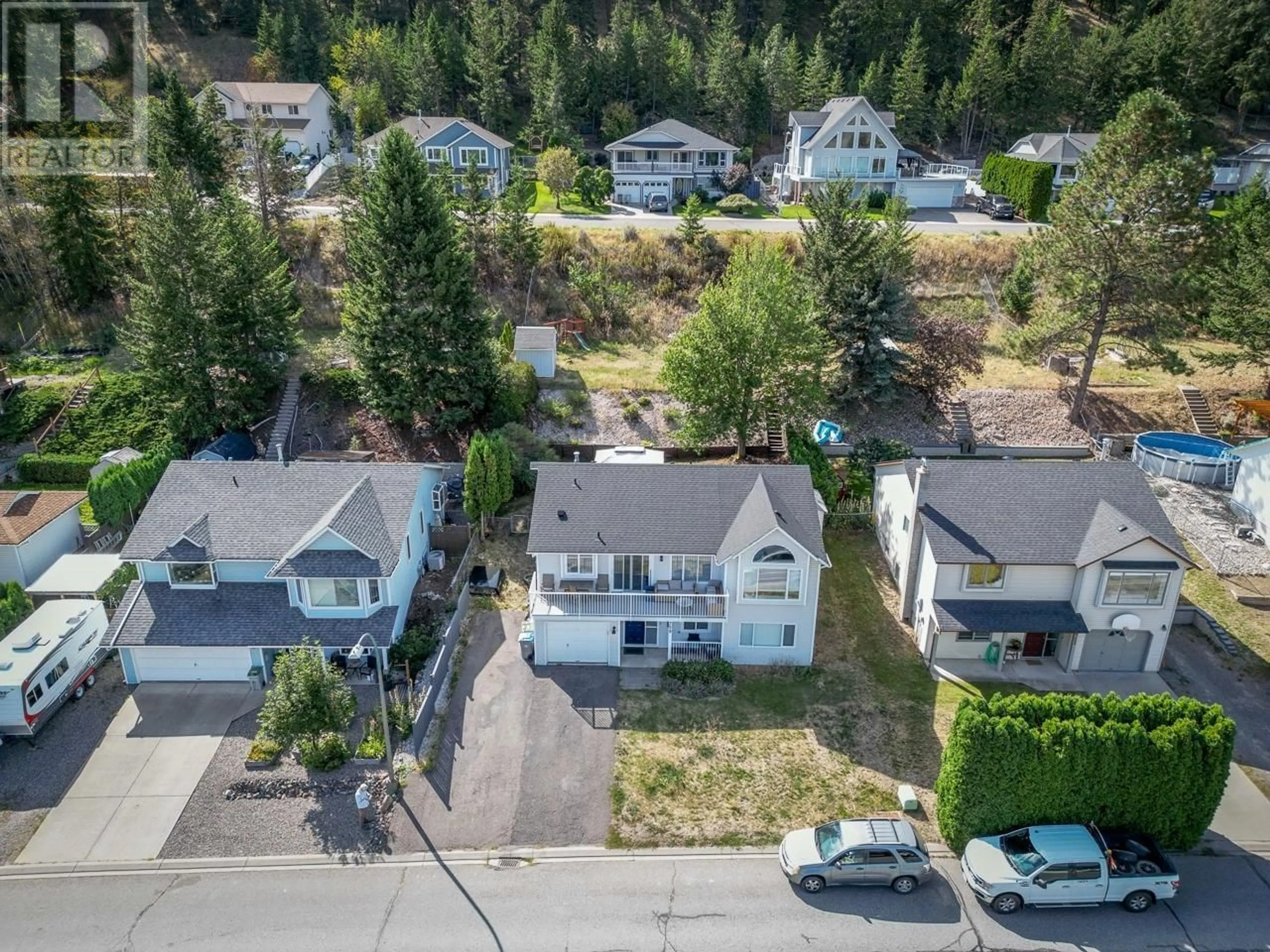 A pic from outside/outdoor area/front of a property/back of a property/a pic from drone, street for 2759 QU'APPELLE BOULEVARD, Kamloops British Columbia V2E2J9