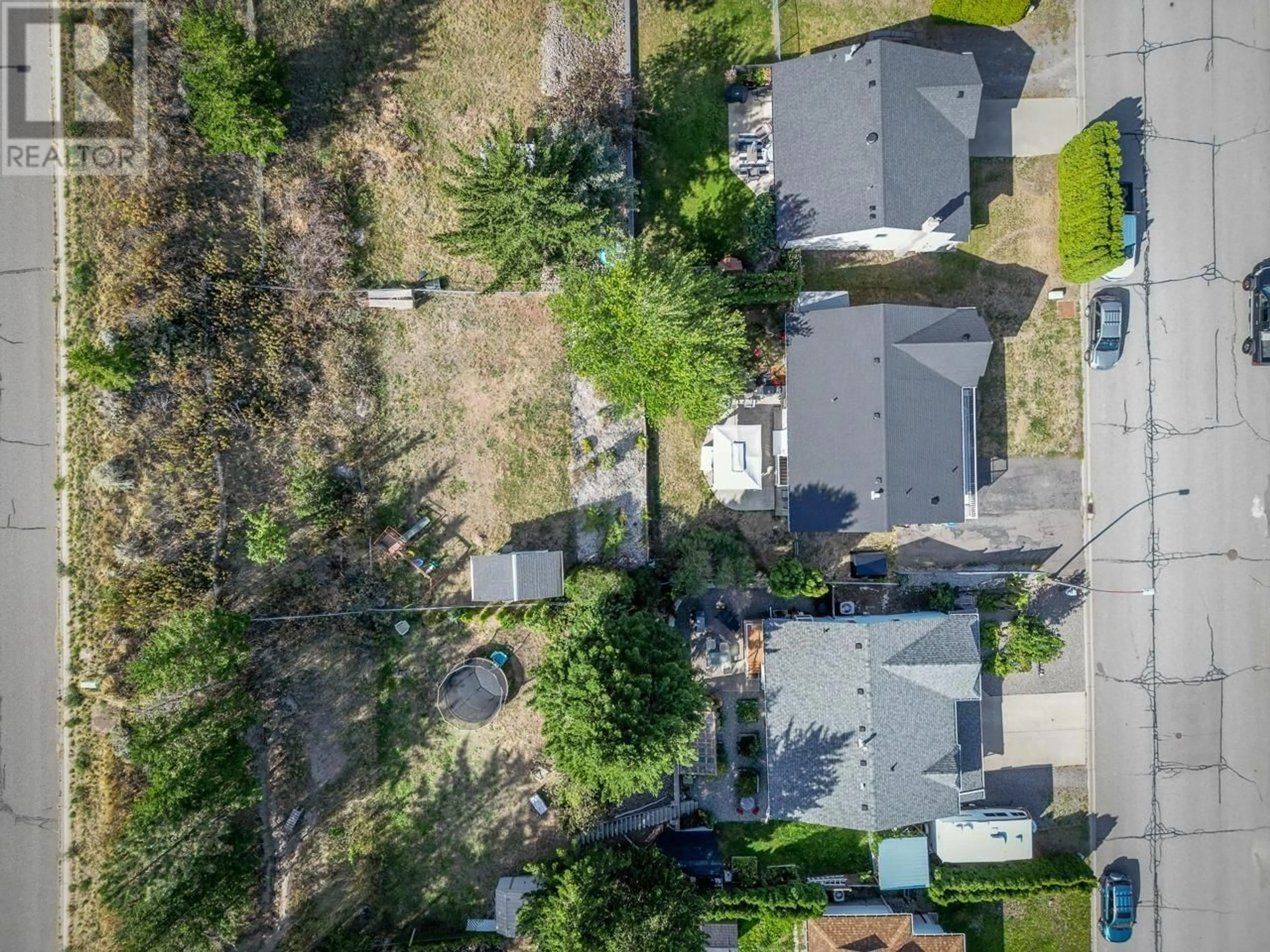 A pic from outside/outdoor area/front of a property/back of a property/a pic from drone, street for 2759 QU'APPELLE BOULEVARD, Kamloops British Columbia V2E2J9
