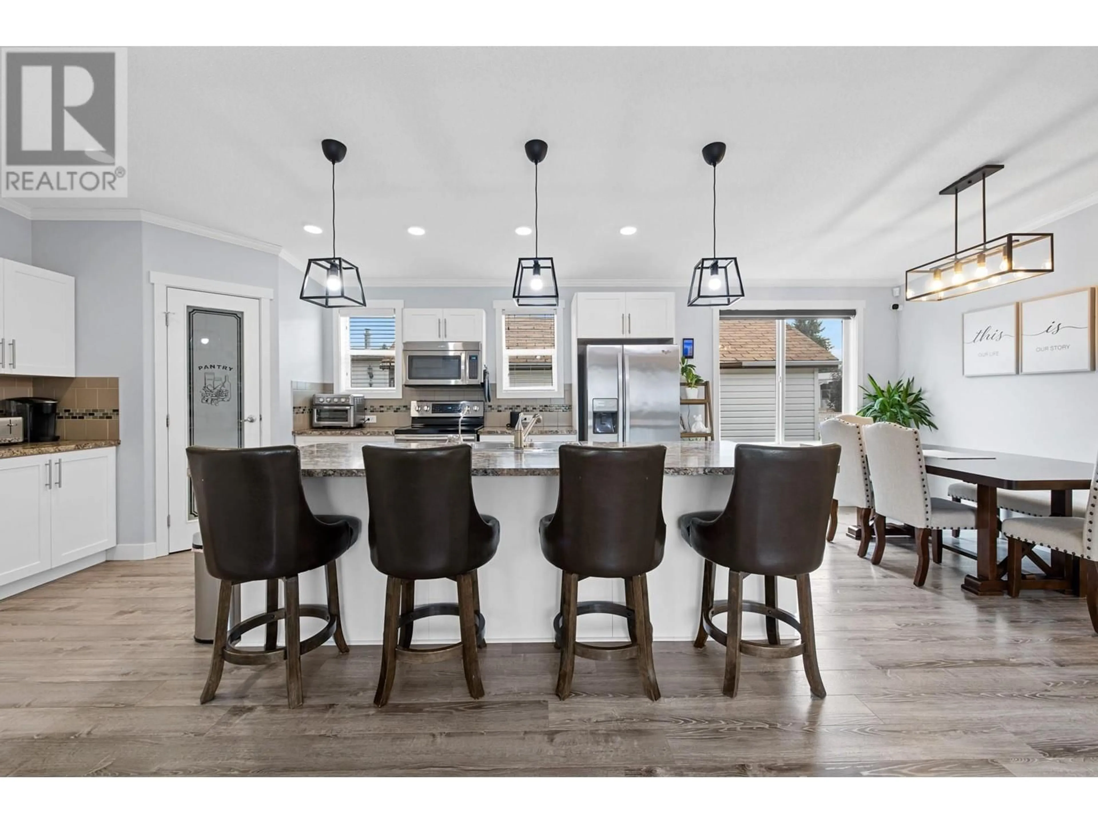 Open concept kitchen, wood/laminate floor for 33A - 9020 JIM BAILEY ROAD, Kelowna British Columbia V4V1E5