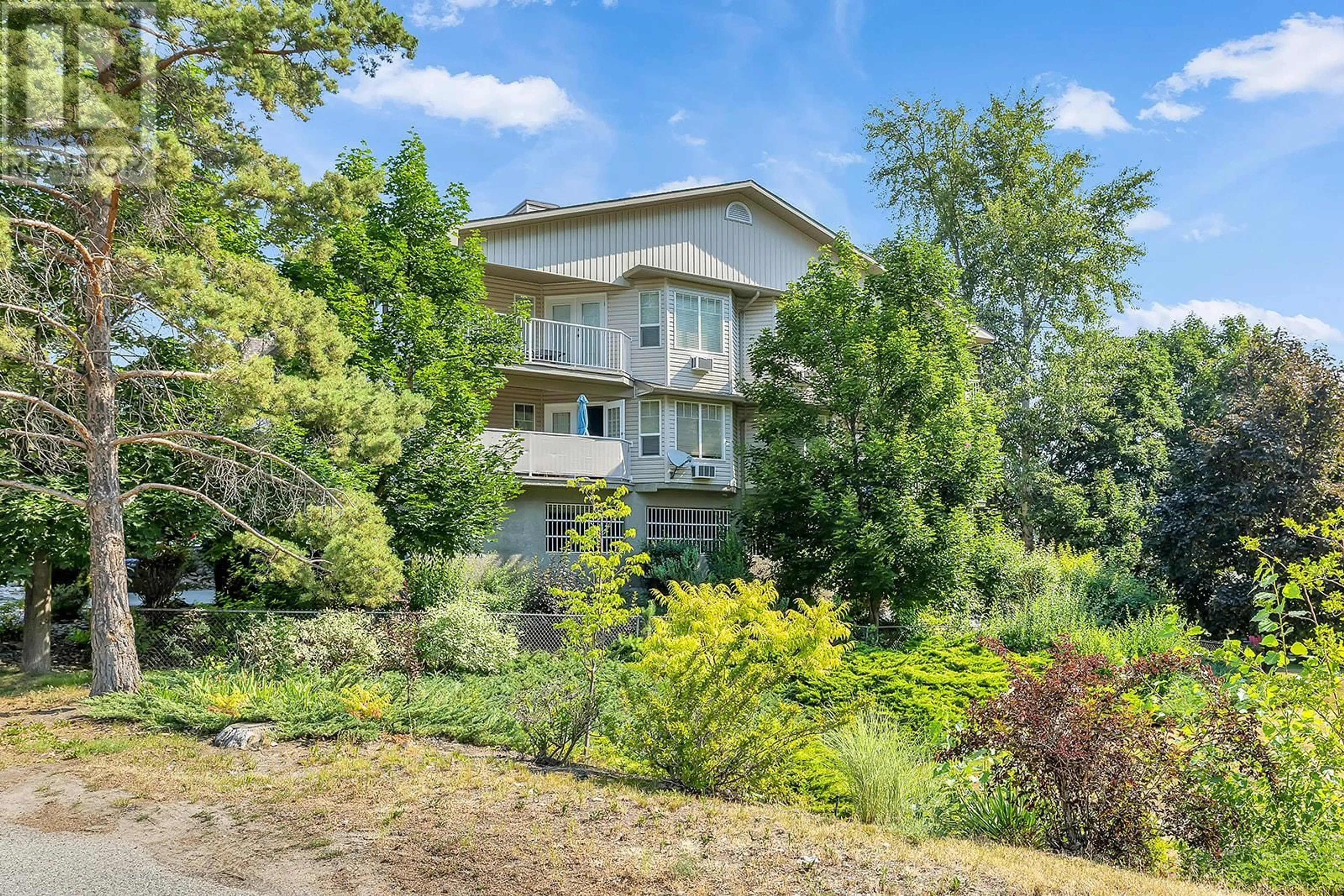 A pic from outside/outdoor area/front of a property/back of a property/a pic from drone, water/lake/river/ocean view for 101 - 2733 RIFFINGTON PLACE, West Kelowna British Columbia V1Z3L1