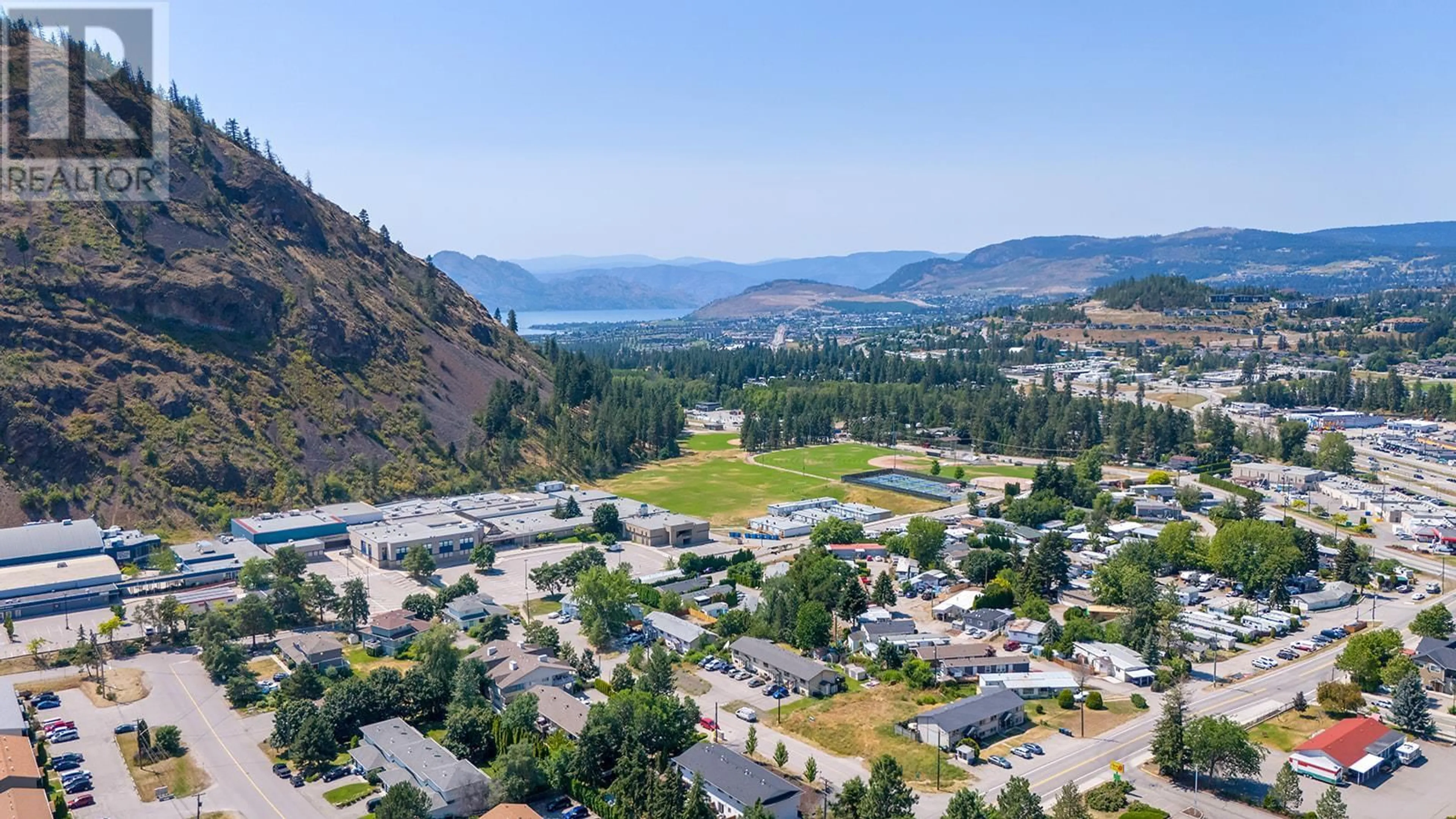 A pic from outside/outdoor area/front of a property/back of a property/a pic from drone, mountain view for 101 - 2733 RIFFINGTON PLACE, West Kelowna British Columbia V1Z3L1