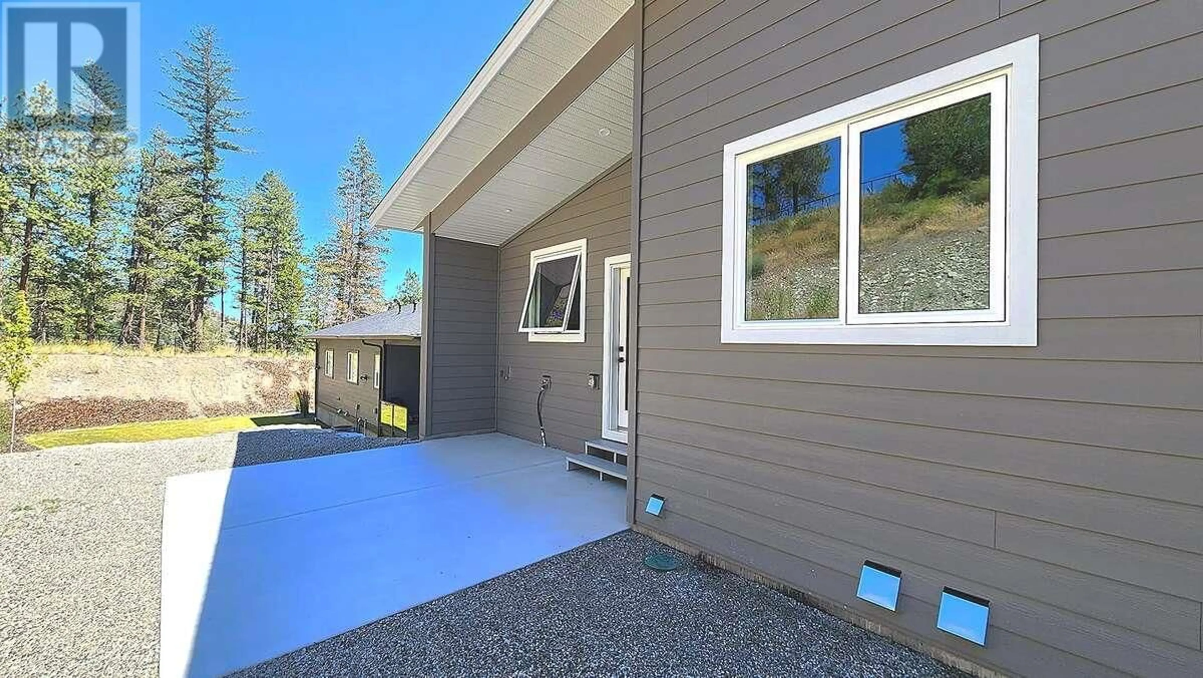 Home with vinyl exterior material, mountain view for 2852 CANYON CREST DRIVE, West Kelowna British Columbia V4T3A6