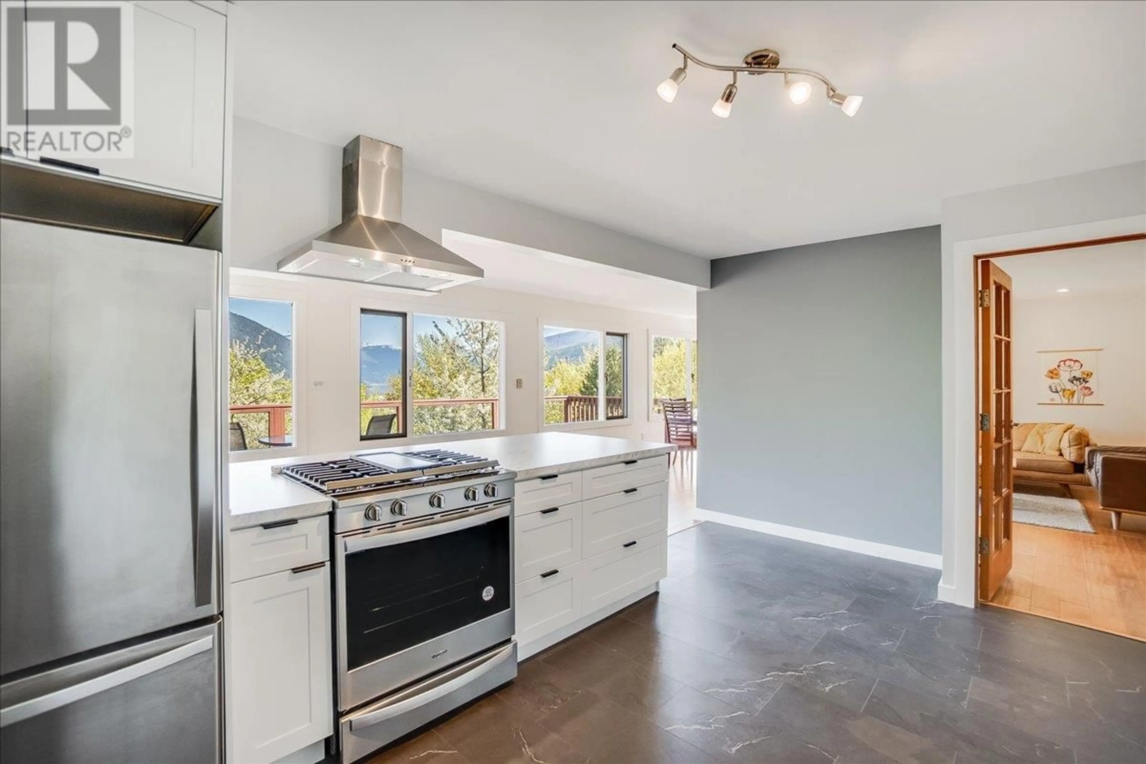 Open concept kitchen, ceramic/tile floor for 604 WASSON STREET, Nelson British Columbia V1L3G7