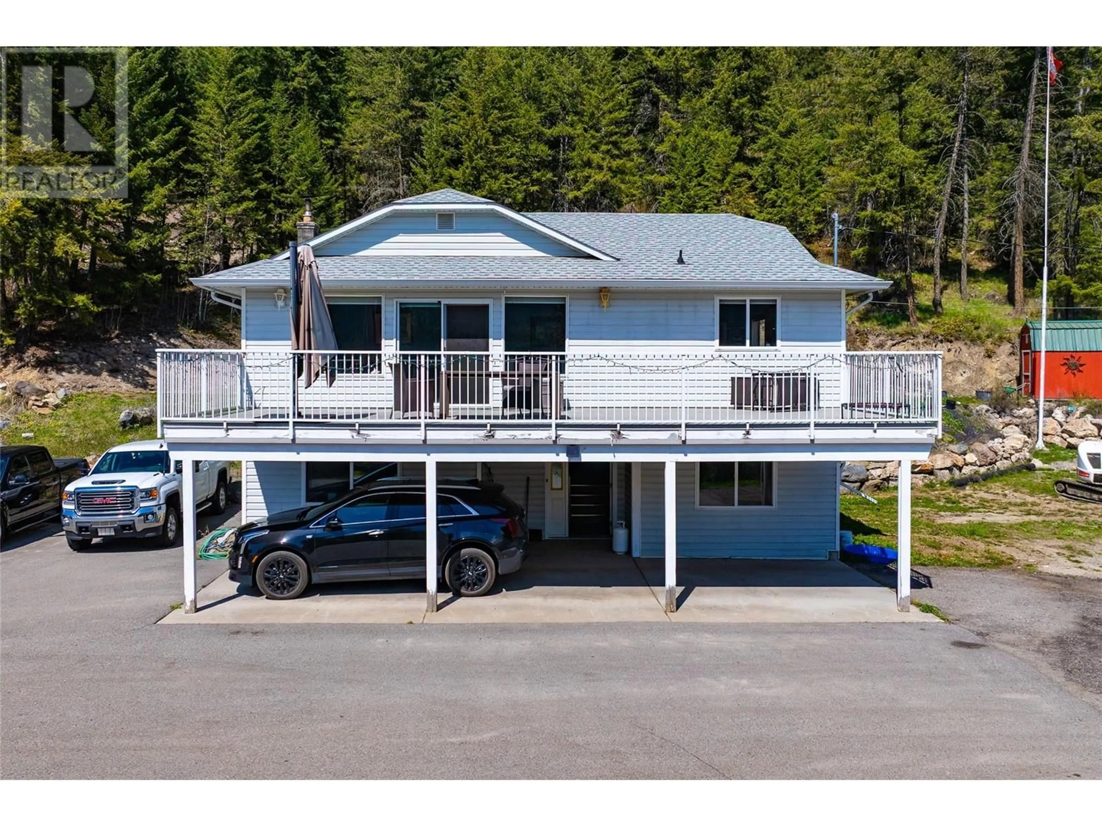 A pic from outside/outdoor area/front of a property/back of a property/a pic from drone, water/lake/river/ocean view for 7114 GOSHAWK ROAD, Kelowna British Columbia V1P1H9