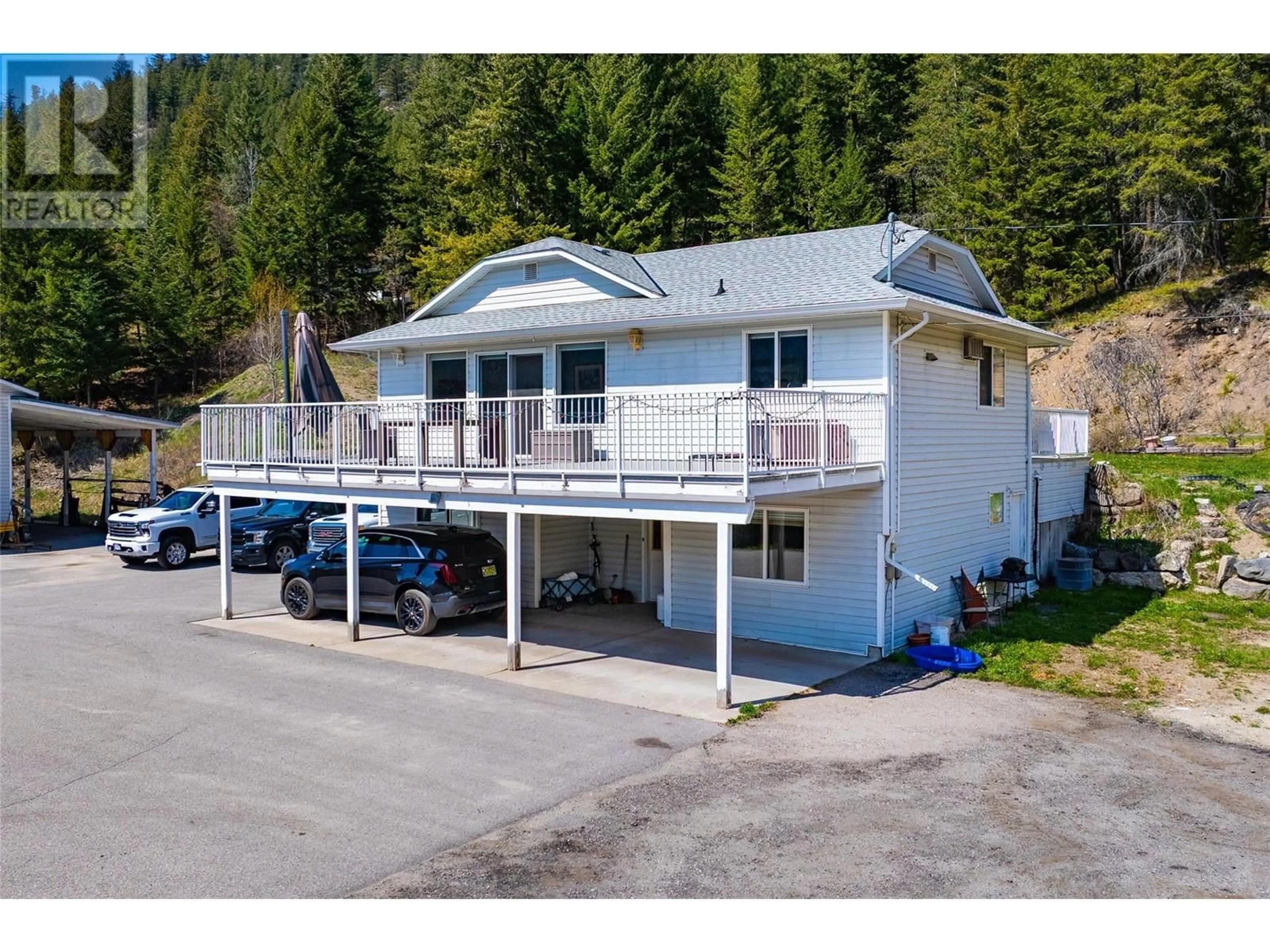 A pic from outside/outdoor area/front of a property/back of a property/a pic from drone, unknown for 7114 GOSHAWK ROAD, Kelowna British Columbia V1P1H9