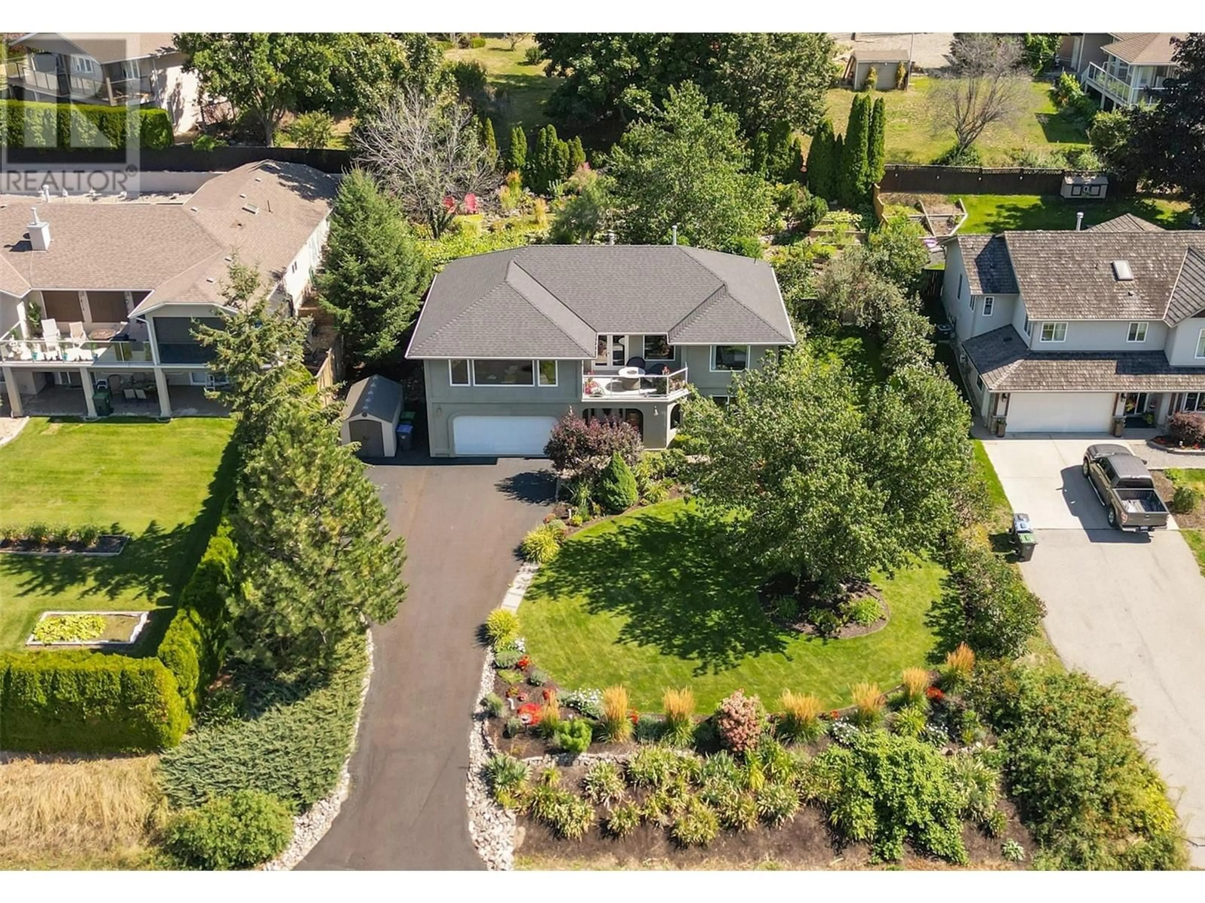 A pic from outside/outdoor area/front of a property/back of a property/a pic from drone, street for 10855 TYNDALL ROAD, Lake Country British Columbia V4V1N8