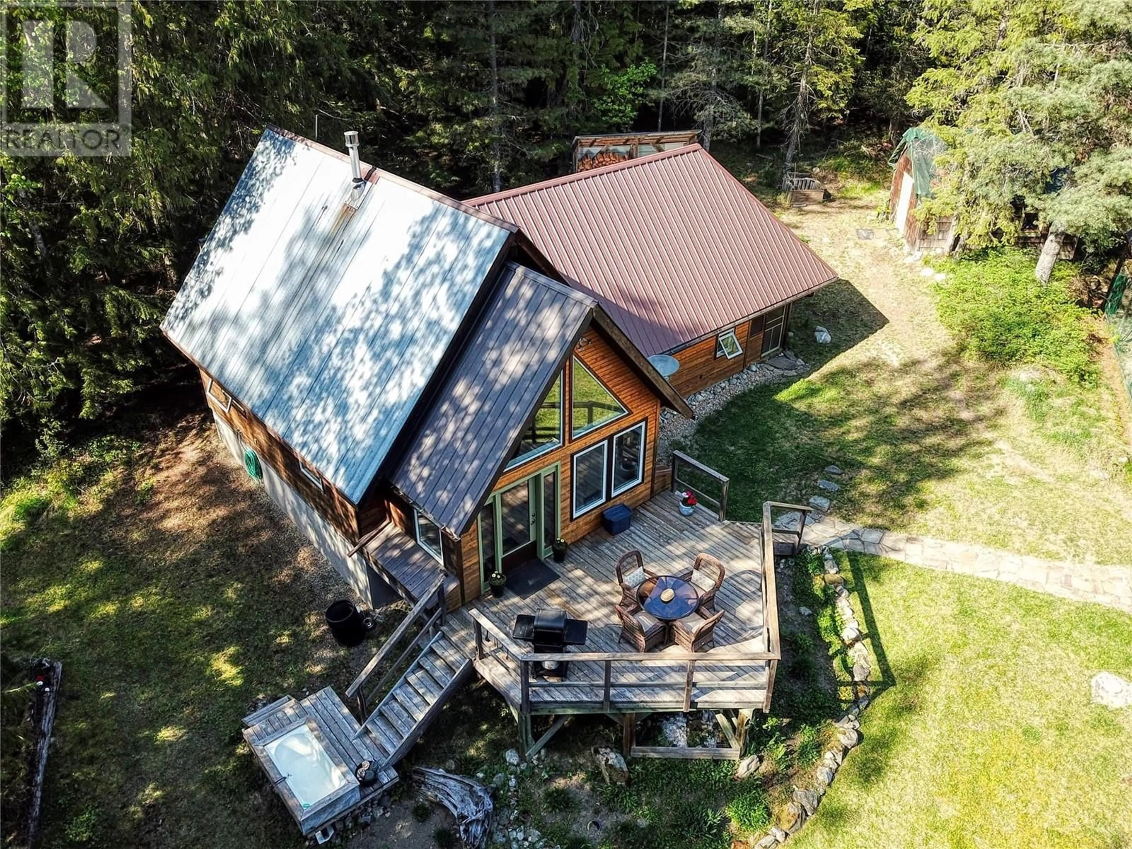 A pic from outside/outdoor area/front of a property/back of a property/a pic from drone, unknown for 16317 CEDAR ROAD, Crawford Bay British Columbia V0B1E0