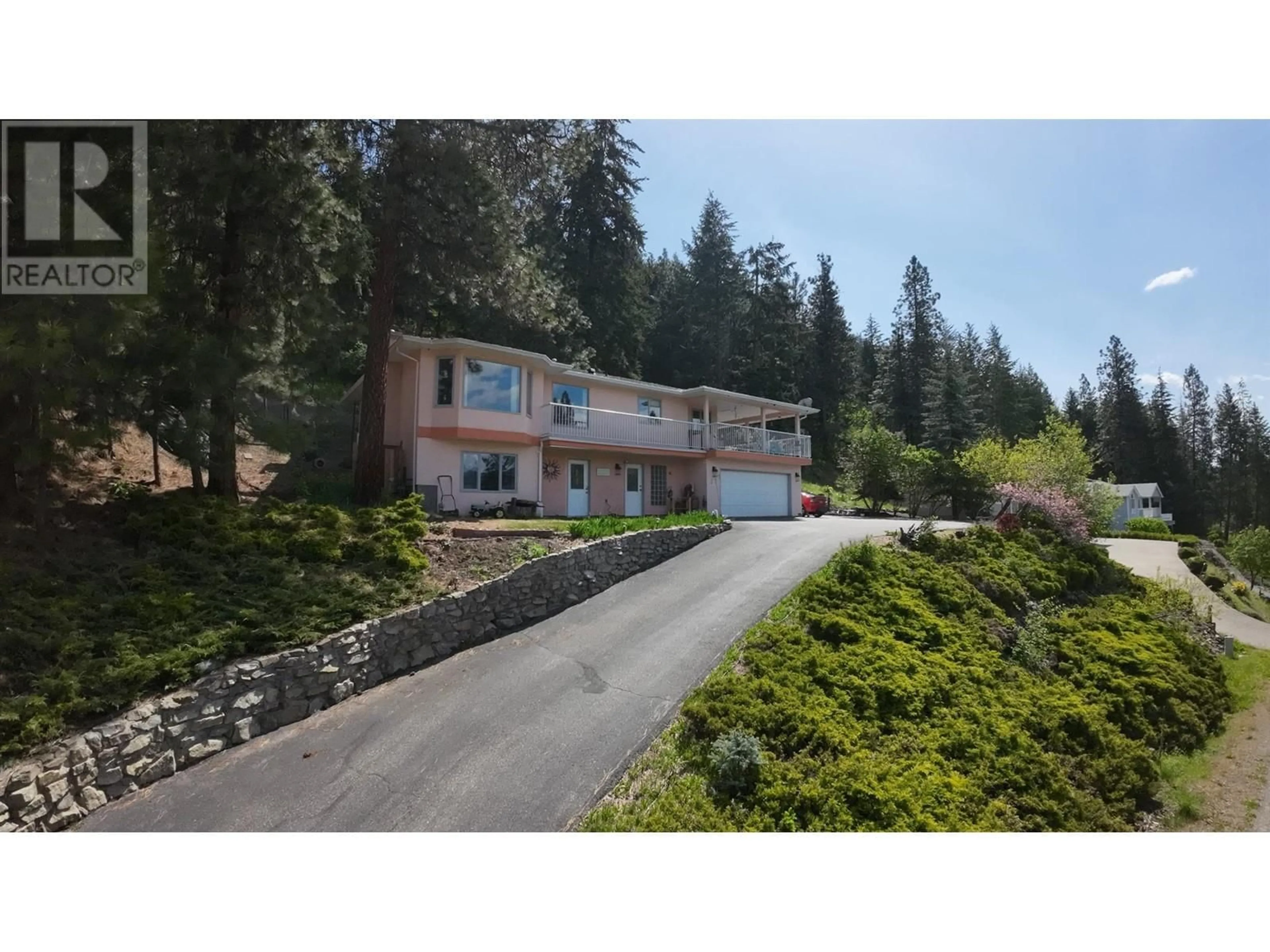 A pic from outside/outdoor area/front of a property/back of a property/a pic from drone, unknown for 9085 TRONSON ROAD, Vernon British Columbia V1H1E2