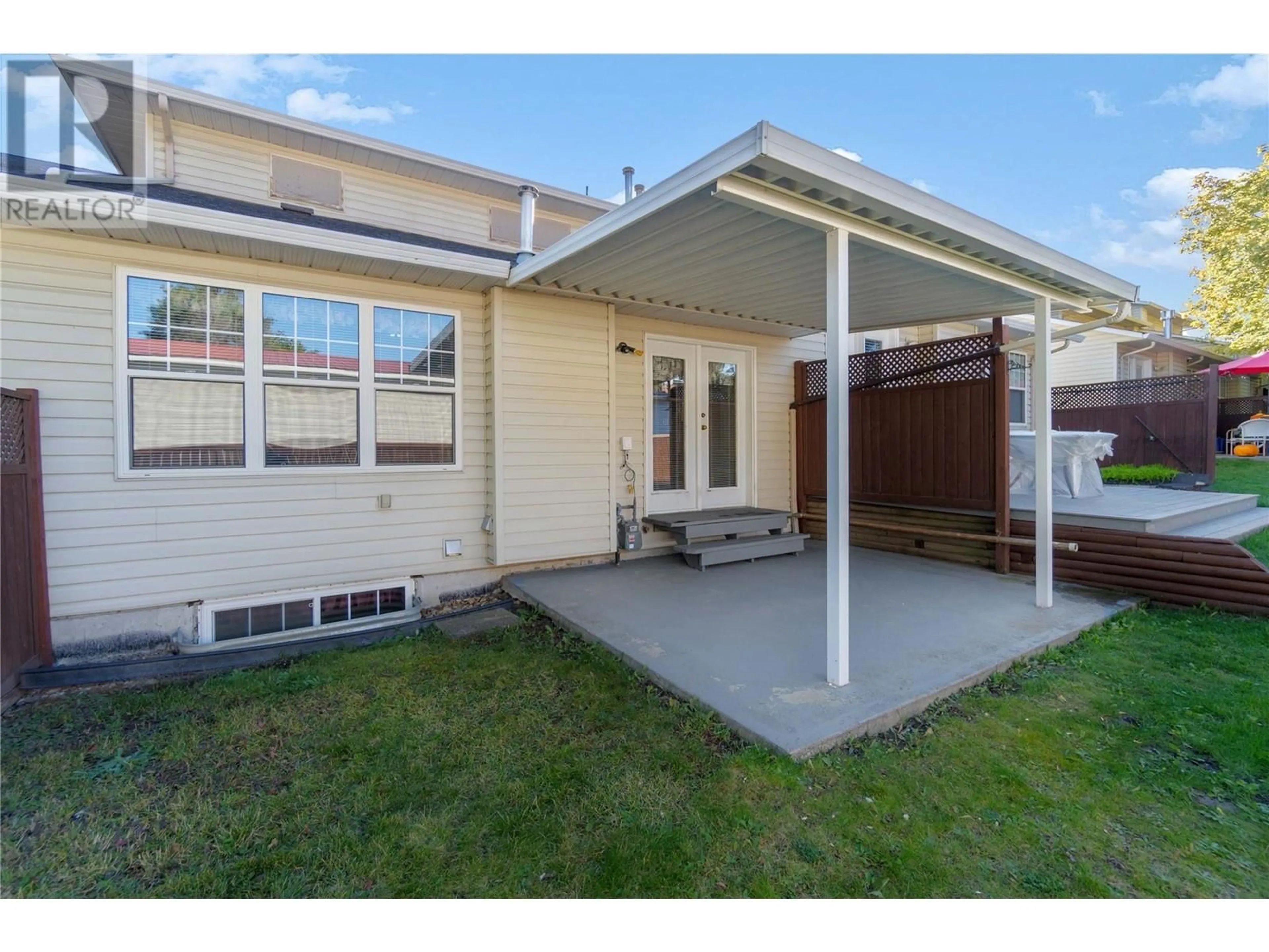 Home with vinyl exterior material, street for 6 - 3485 ROSEDALE AVENUE, Armstrong British Columbia V0E1B2