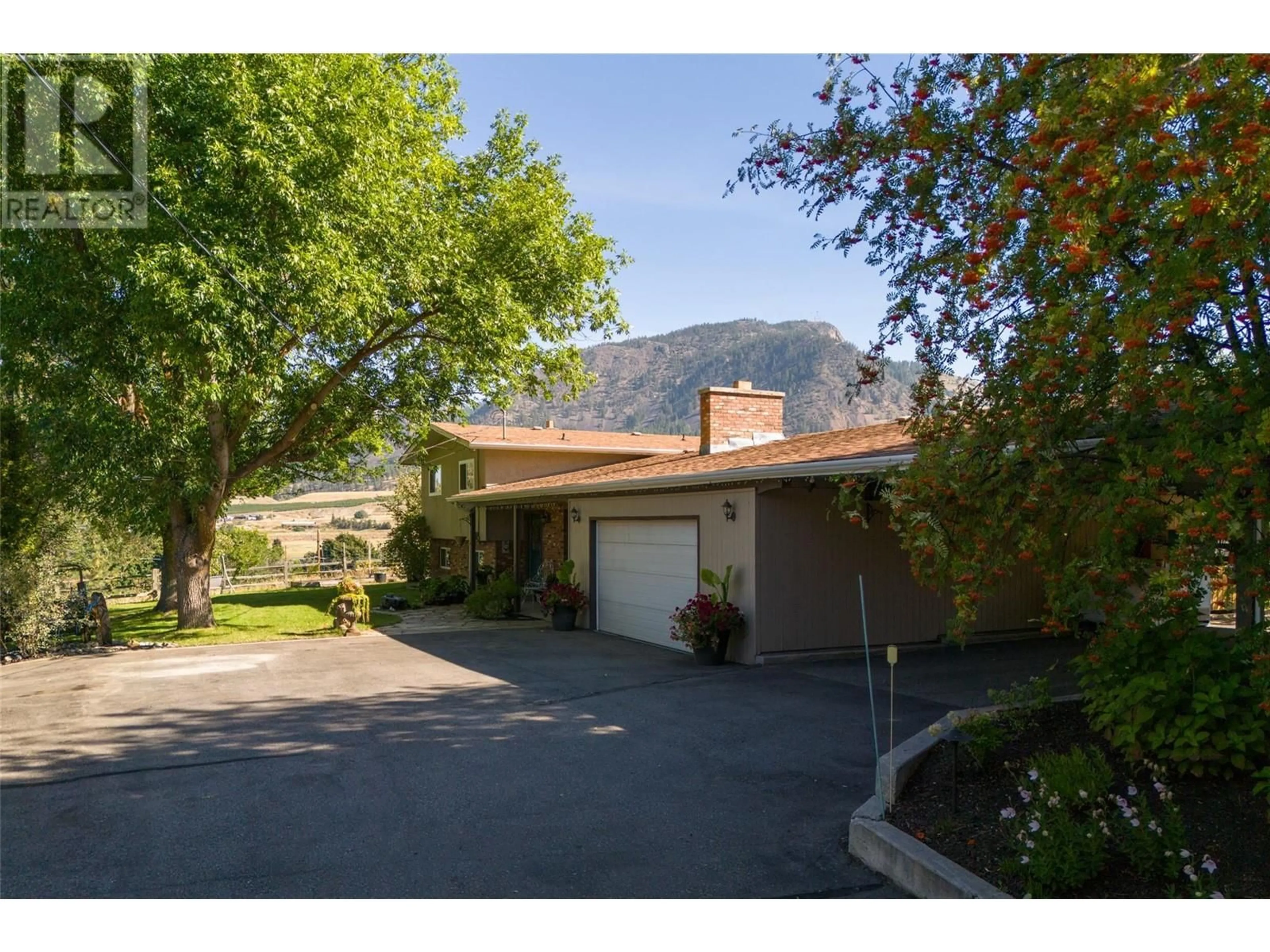 A pic from outside/outdoor area/front of a property/back of a property/a pic from drone, mountain view for 2351 GALLAGHER ROAD, Kelowna British Columbia V1P1G9