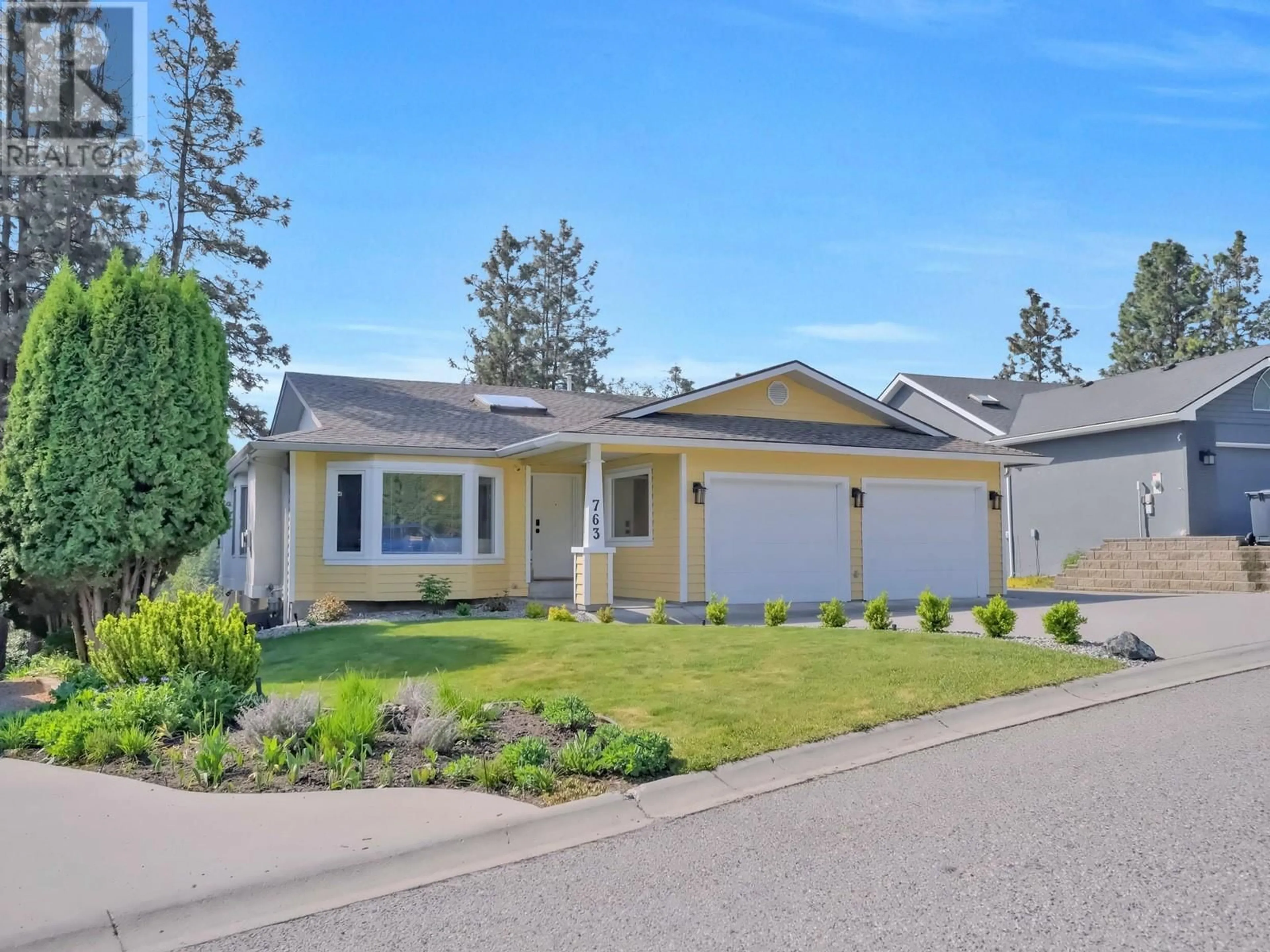 Home with vinyl exterior material, street for 763 CASSIAR COURT, Kelowna British Columbia V1V1M7