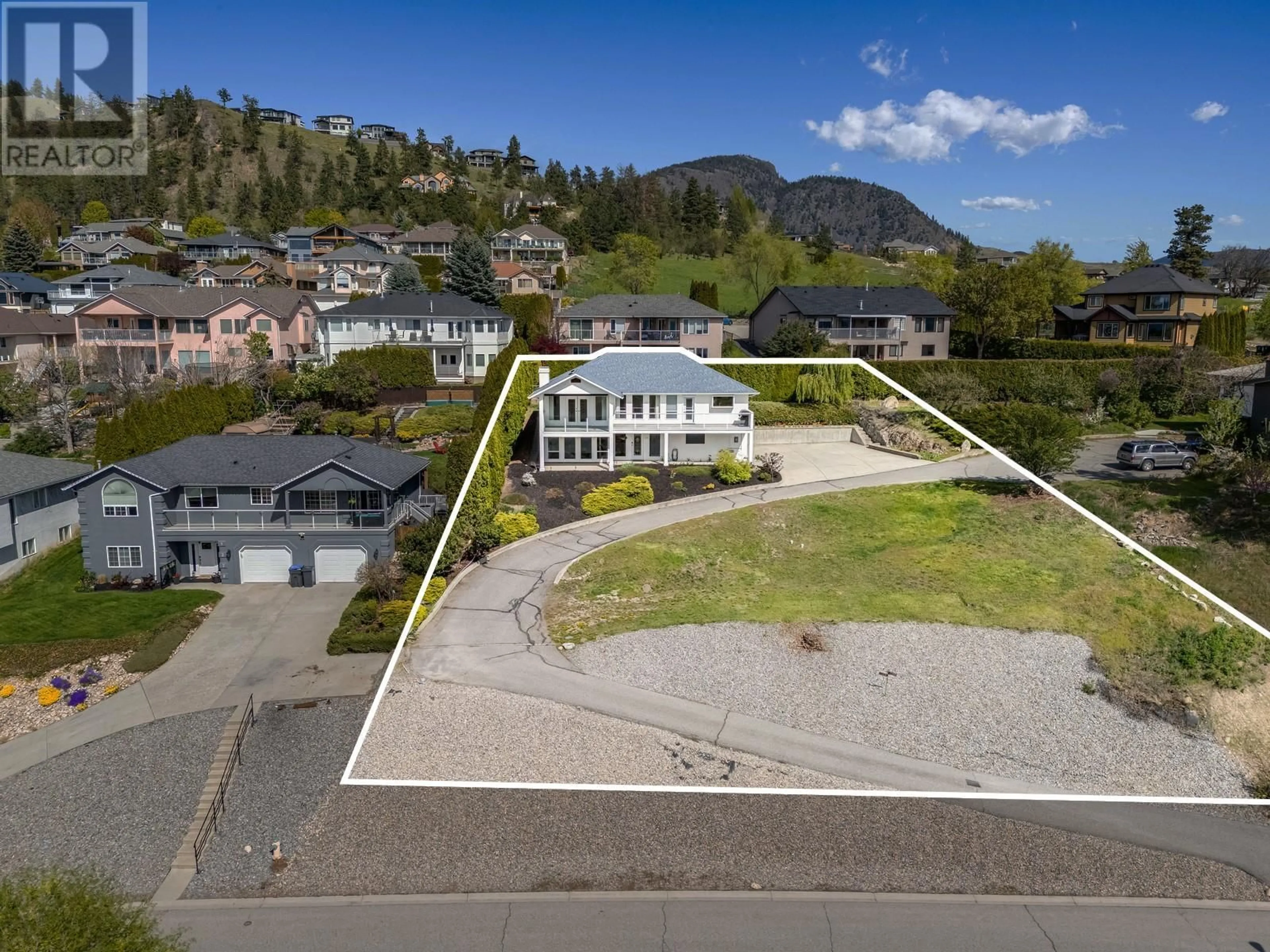 A pic from outside/outdoor area/front of a property/back of a property/a pic from drone, mountain view for 1389 BENTIEN ROAD, Kelowna British Columbia V1X7K3