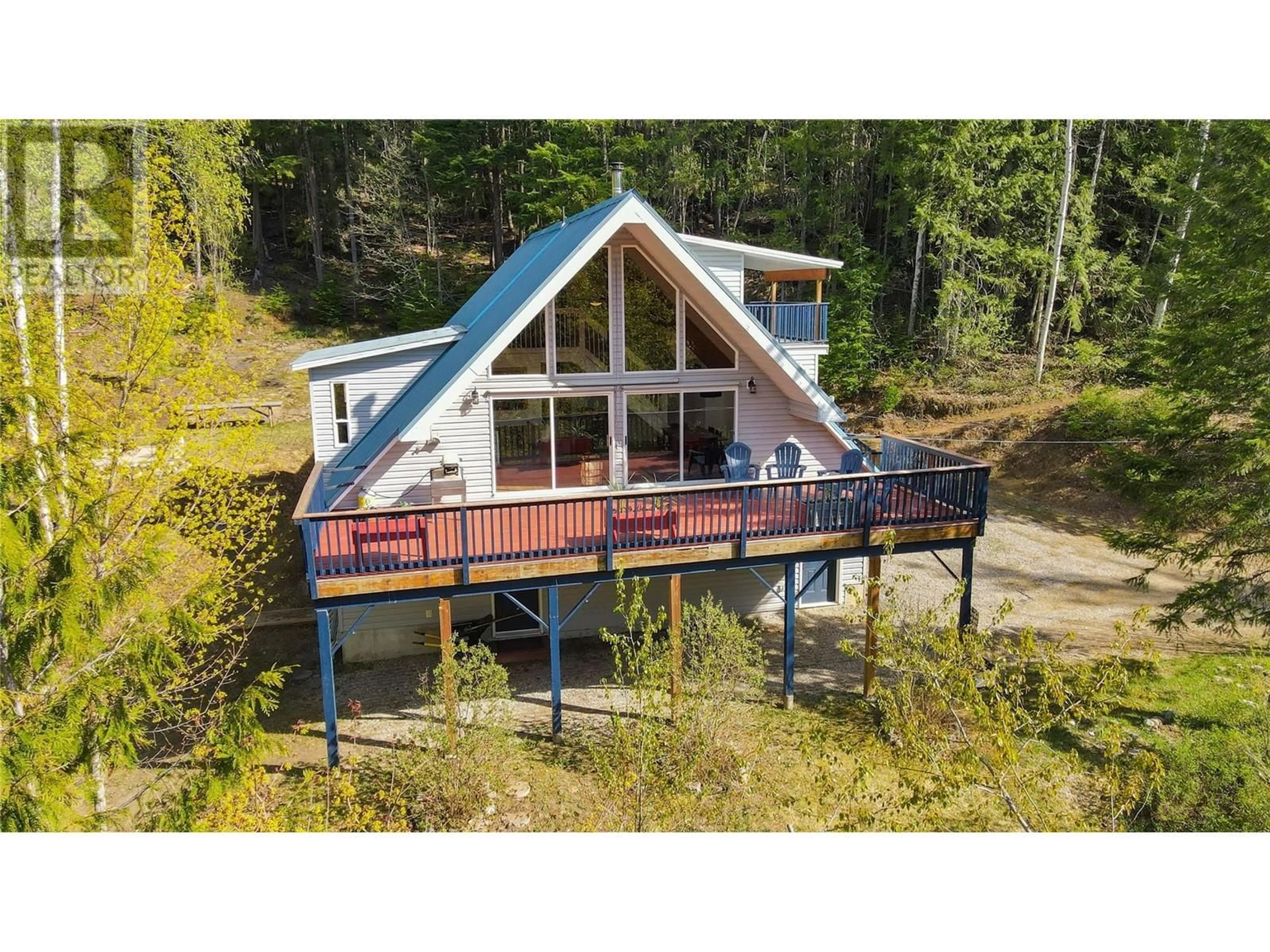 A pic from outside/outdoor area/front of a property/back of a property/a pic from drone, water/lake/river/ocean view for 909 CARNEY BRIDGE ROAD, Salmo British Columbia V0G1Z0