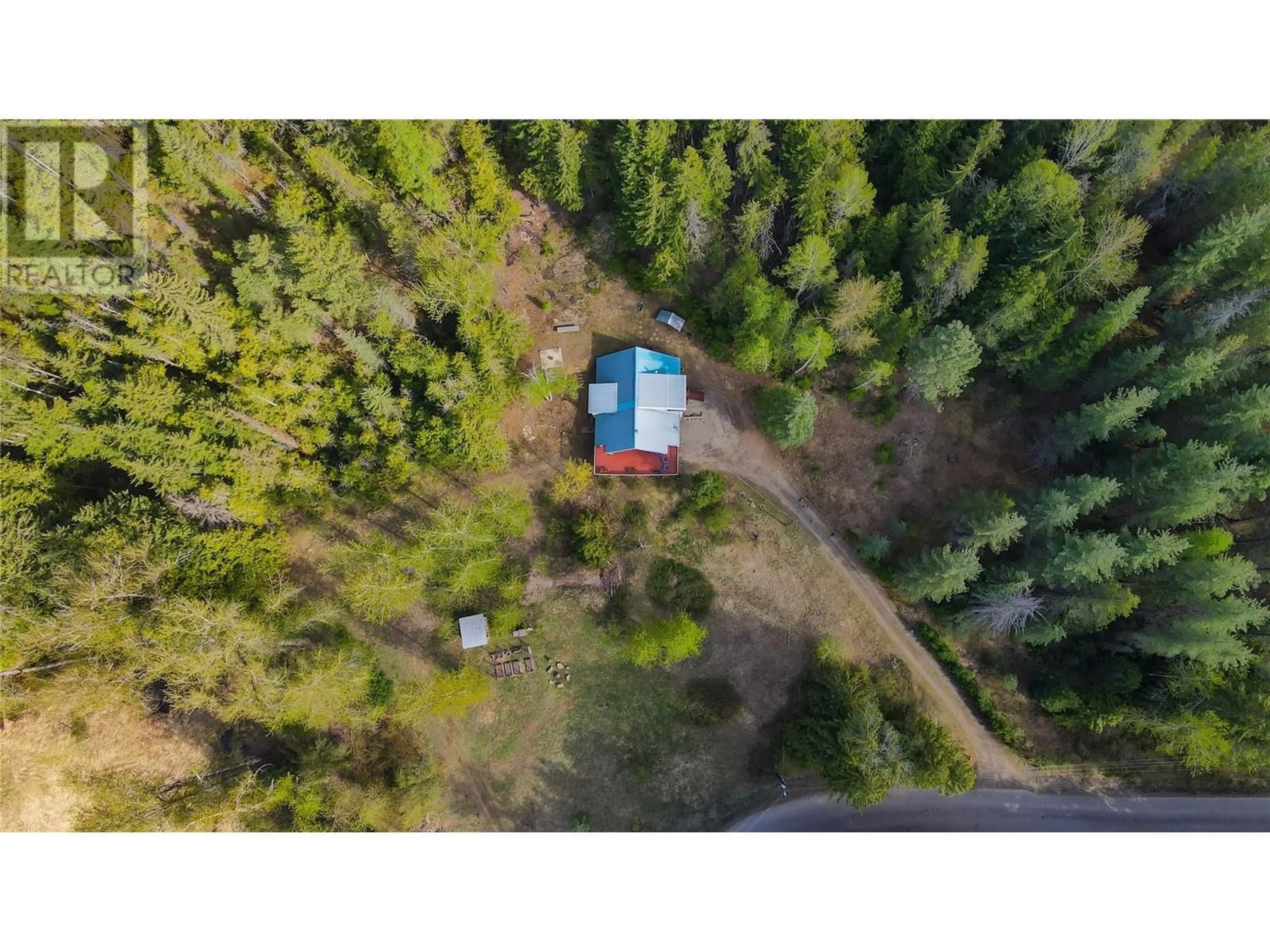 A pic from outside/outdoor area/front of a property/back of a property/a pic from drone, forest/trees view for 909 CARNEY BRIDGE ROAD, Salmo British Columbia V0G1Z0