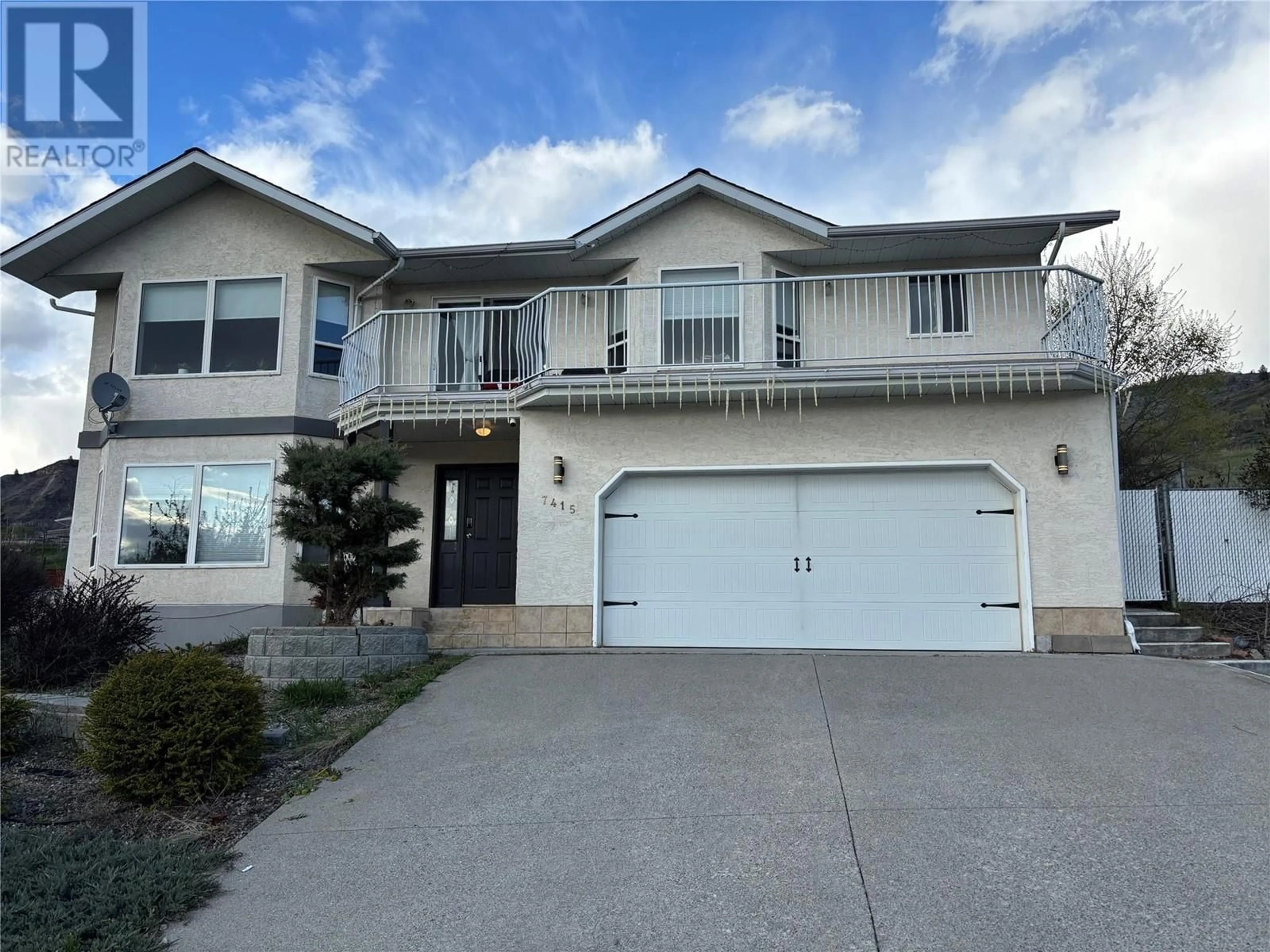 Home with vinyl exterior material, street for 7415 VALLEY HEIGHTS DRIVE, Grand Forks British Columbia V0H1H0