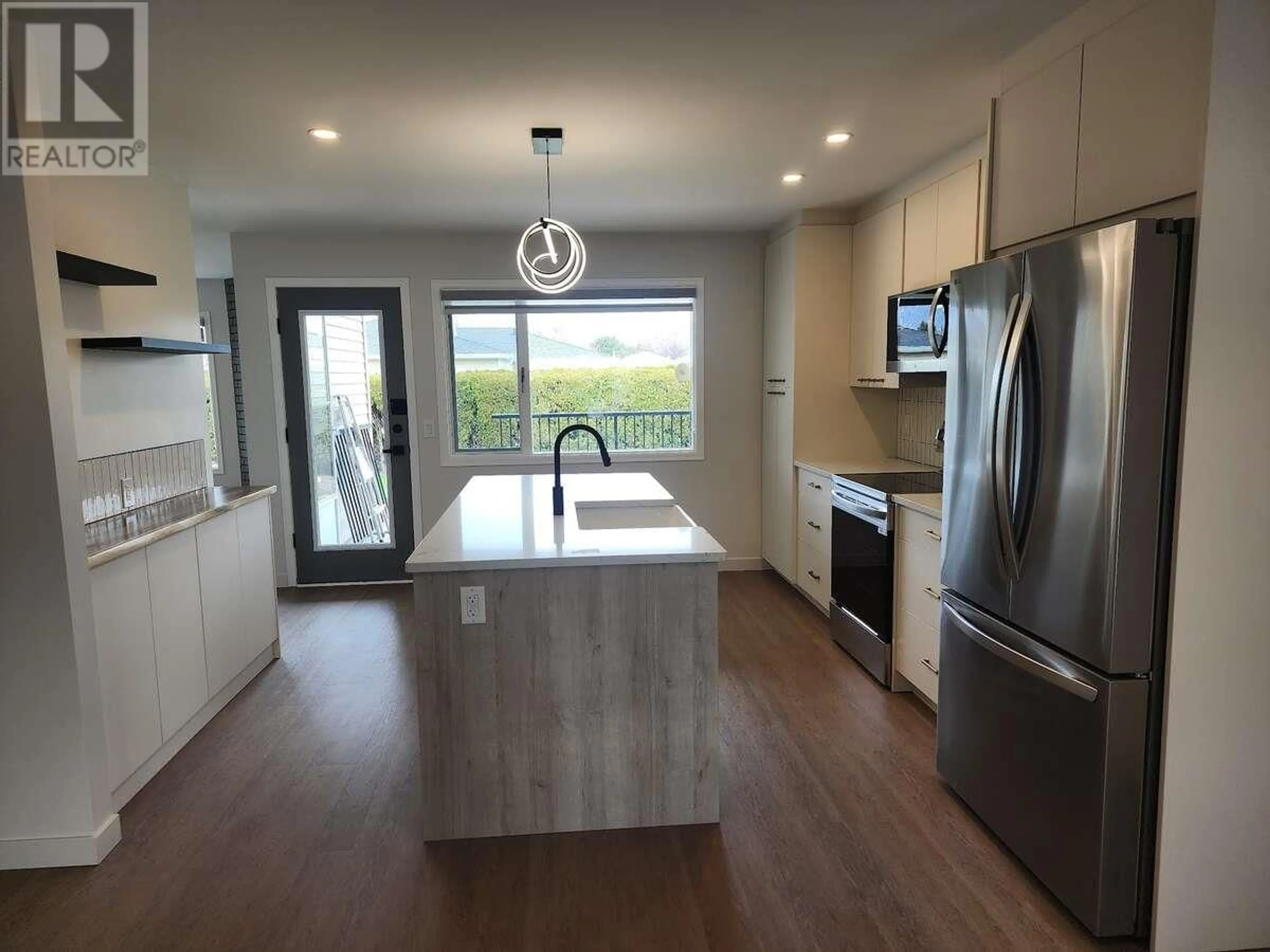 Open concept kitchen, unknown for 397 - 1260 RAYMER AVENUE, Kelowna British Columbia V1W3S7
