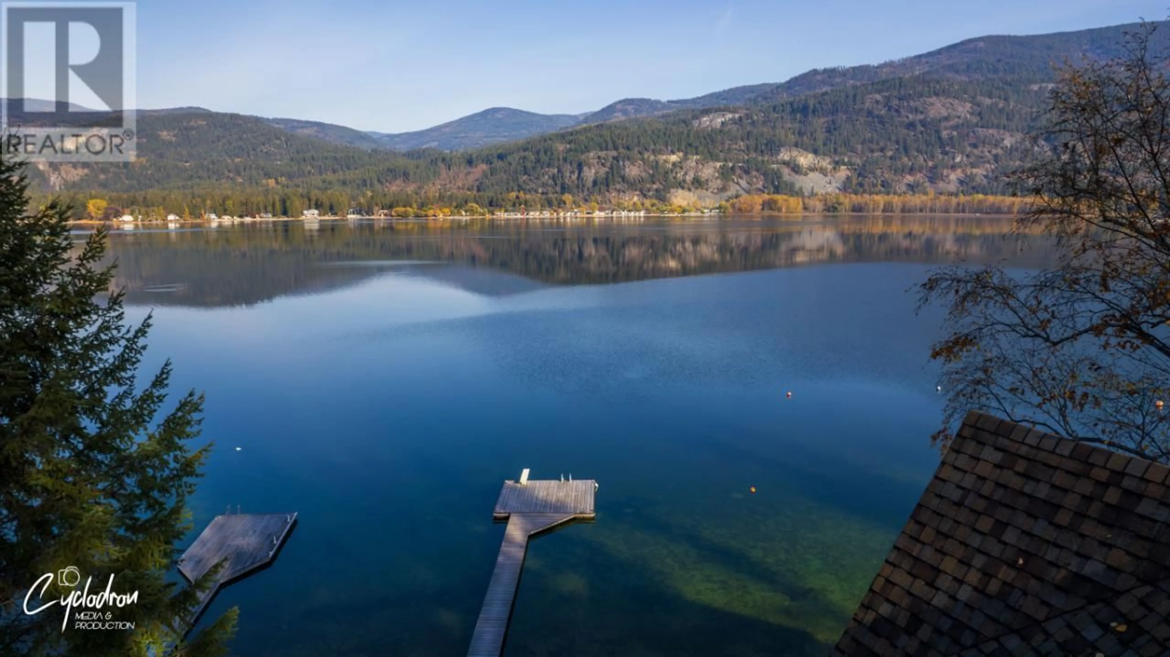 A pic from outside/outdoor area/front of a property/back of a property/a pic from drone, water/lake/river/ocean view for 1722 WEST LAKE DRIVE, Christina Lake British Columbia V0H1E0