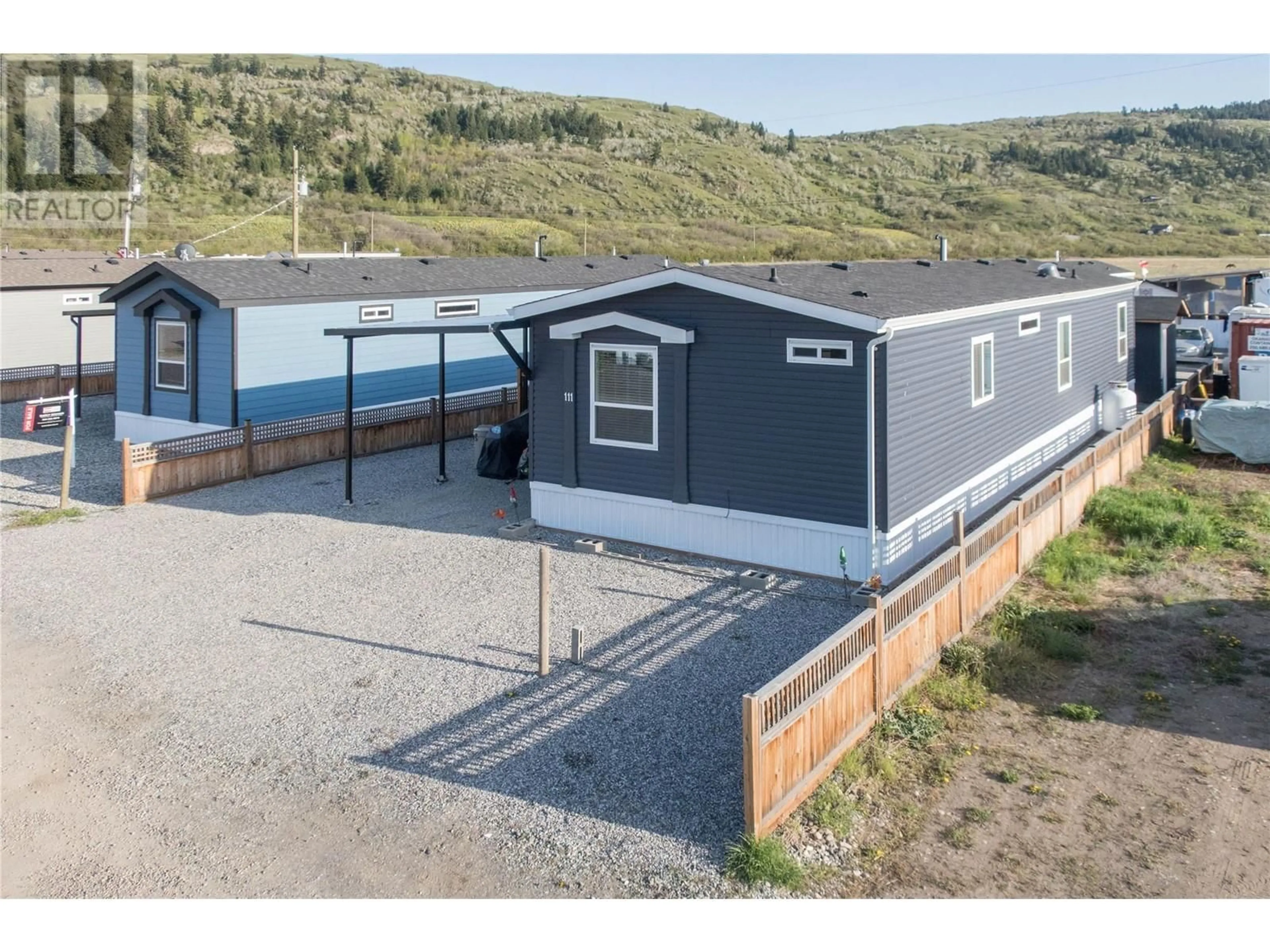 A pic from outside/outdoor area/front of a property/back of a property/a pic from drone, unknown for 111 - 67 ANTOINE ROAD, Vernon British Columbia V1H2A3