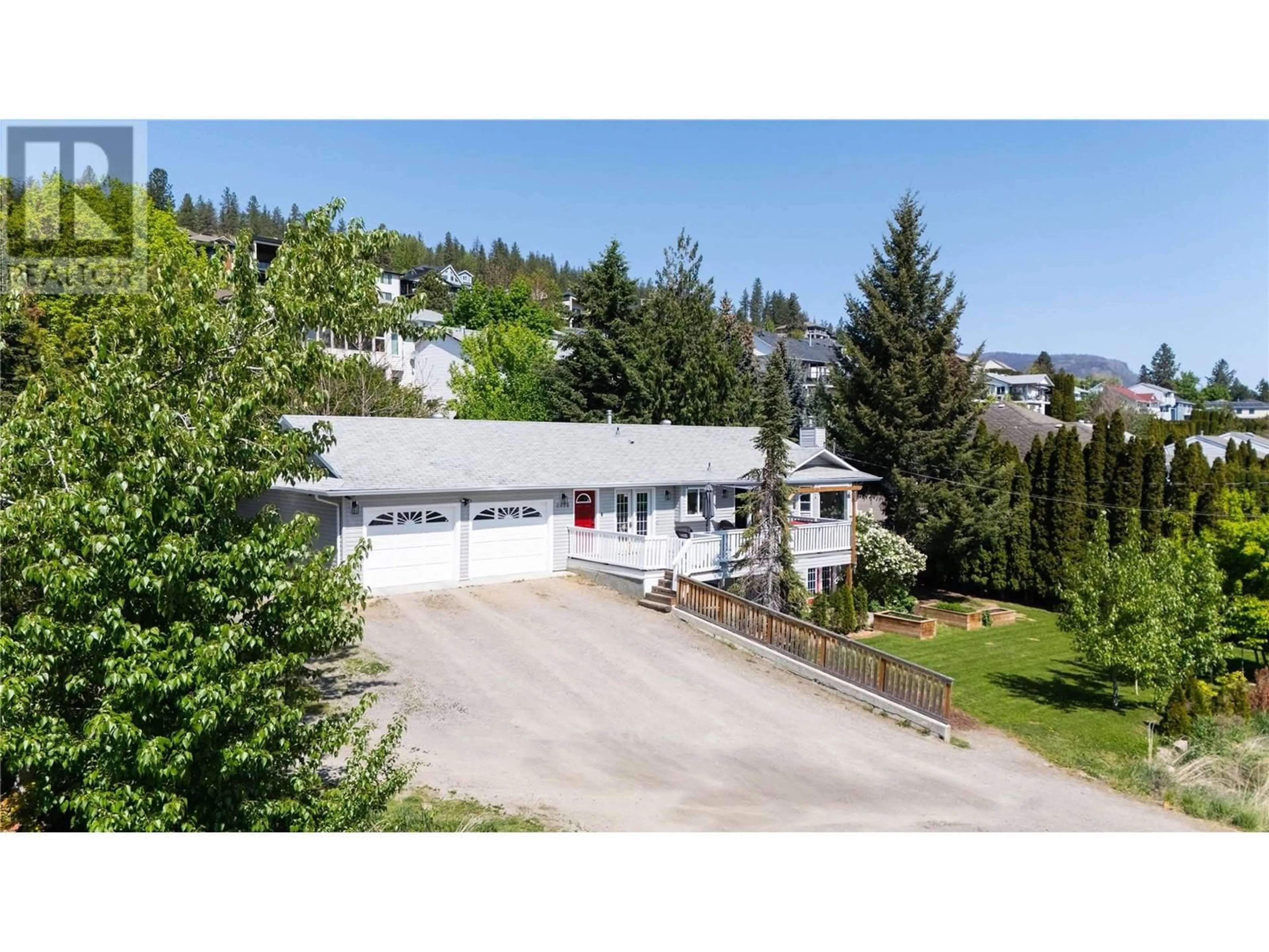 A pic from outside/outdoor area/front of a property/back of a property/a pic from drone, street for 2096 SHAMROCK DRIVE, West Kelowna British Columbia V4T1T8