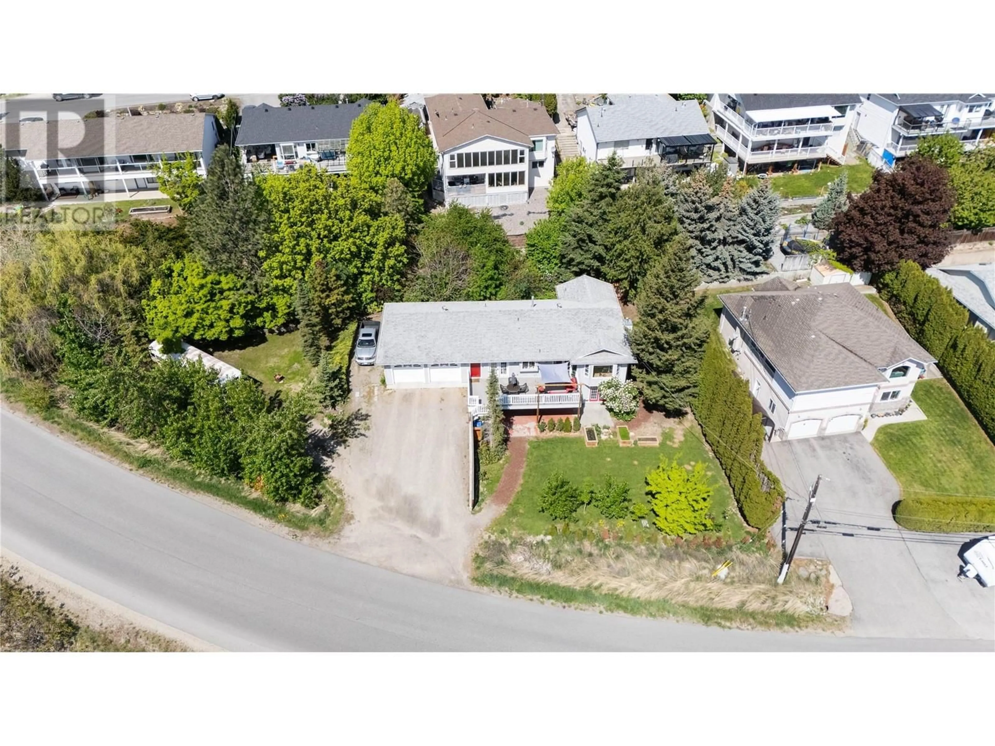 A pic from outside/outdoor area/front of a property/back of a property/a pic from drone, street for 2096 SHAMROCK DRIVE, West Kelowna British Columbia V4T1T8