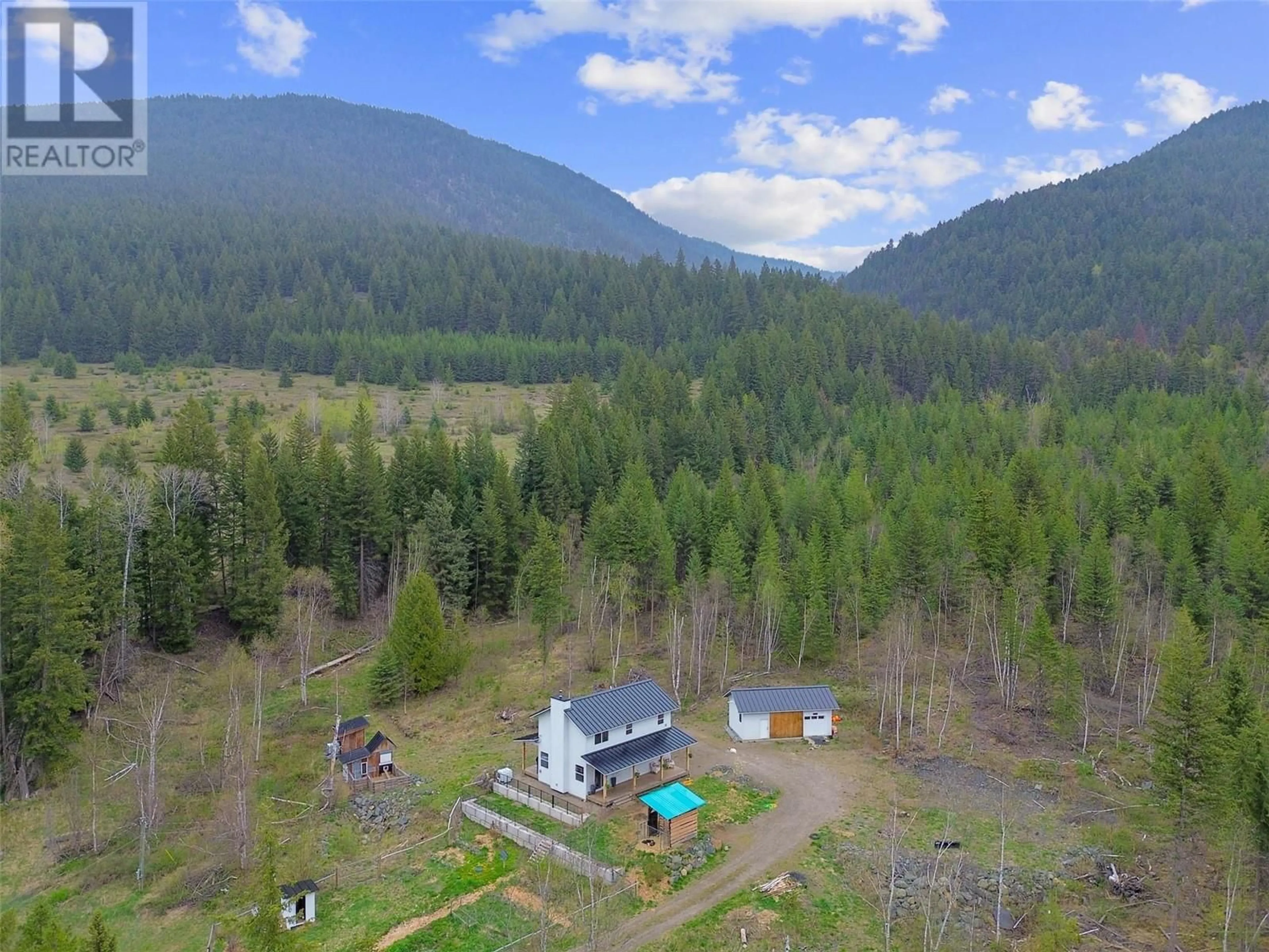 A pic from outside/outdoor area/front of a property/back of a property/a pic from drone, forest/trees view for 5048 HEFFLEY LOUIS CR ROAD, Kamloops British Columbia V0E1Z1