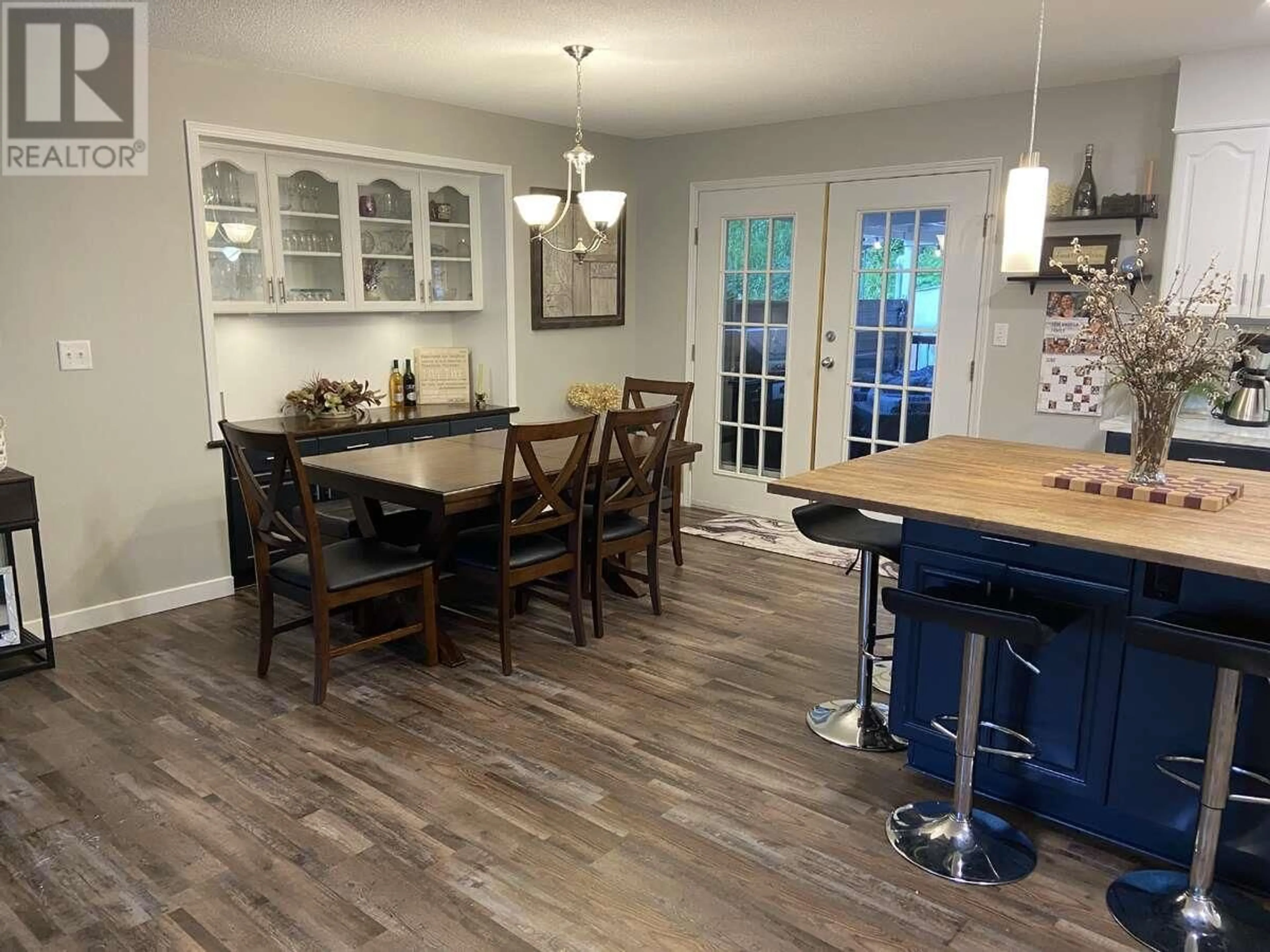 Open concept kitchen, wood/laminate floor for 27 PRESTON CRESCENT, Enderby British Columbia V0E1V1
