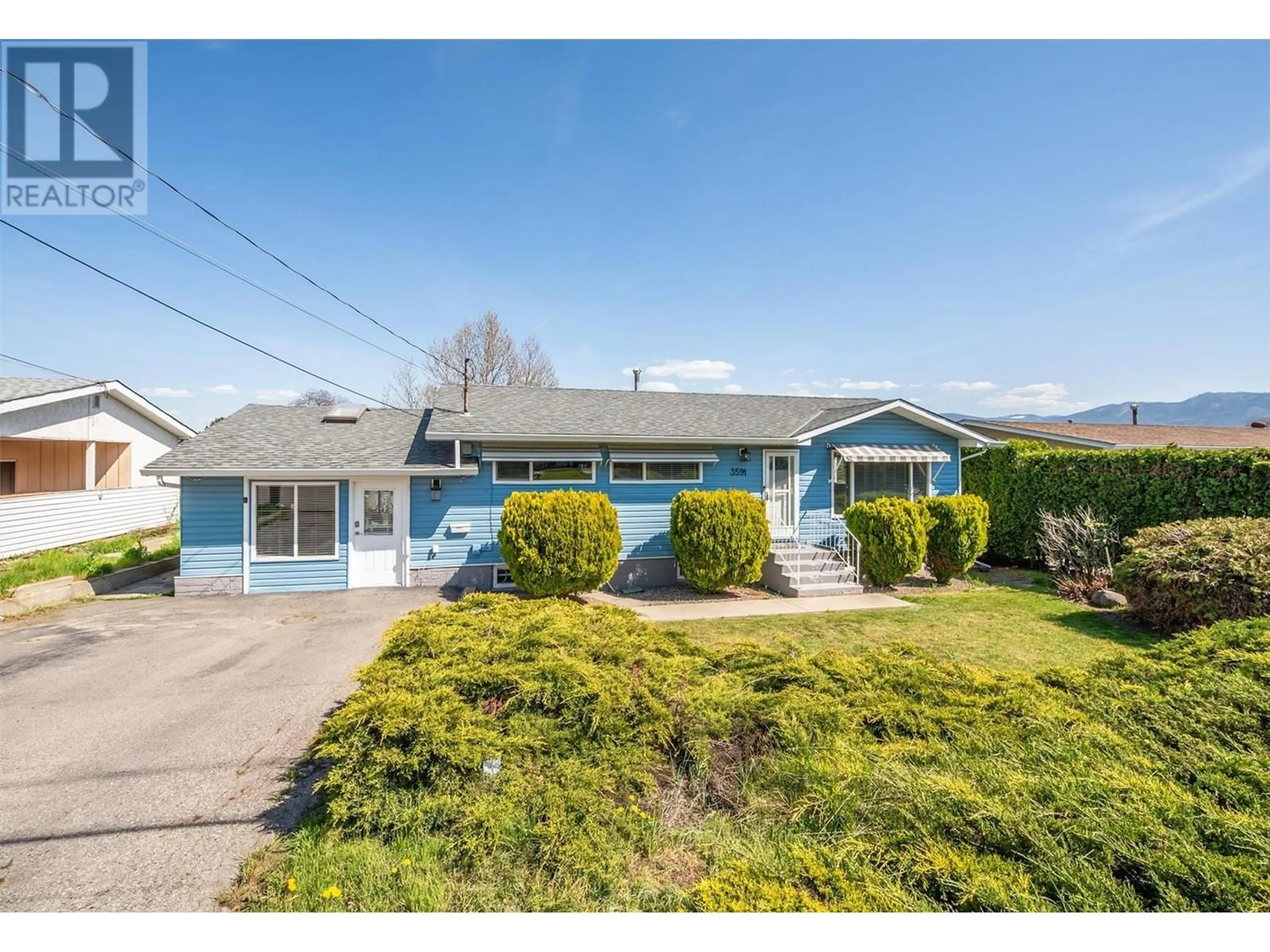 A pic from outside/outdoor area/front of a property/back of a property/a pic from drone, street for 3591 BROWN ROAD, West Kelowna British Columbia V4T1P5
