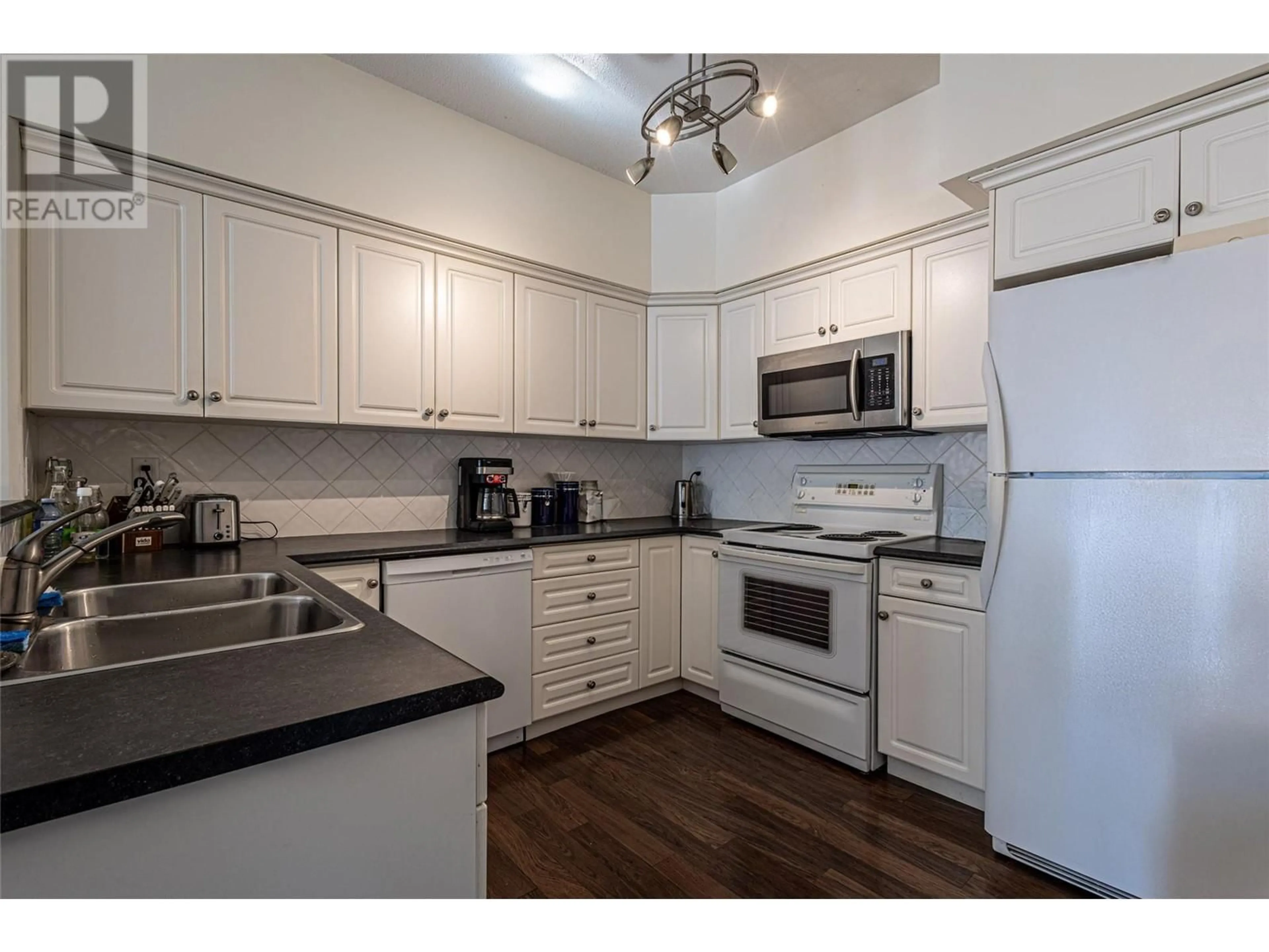 Standard kitchen, unknown for 104 - 680 LEQUIME ROAD, Kelowna British Columbia V1W1A4