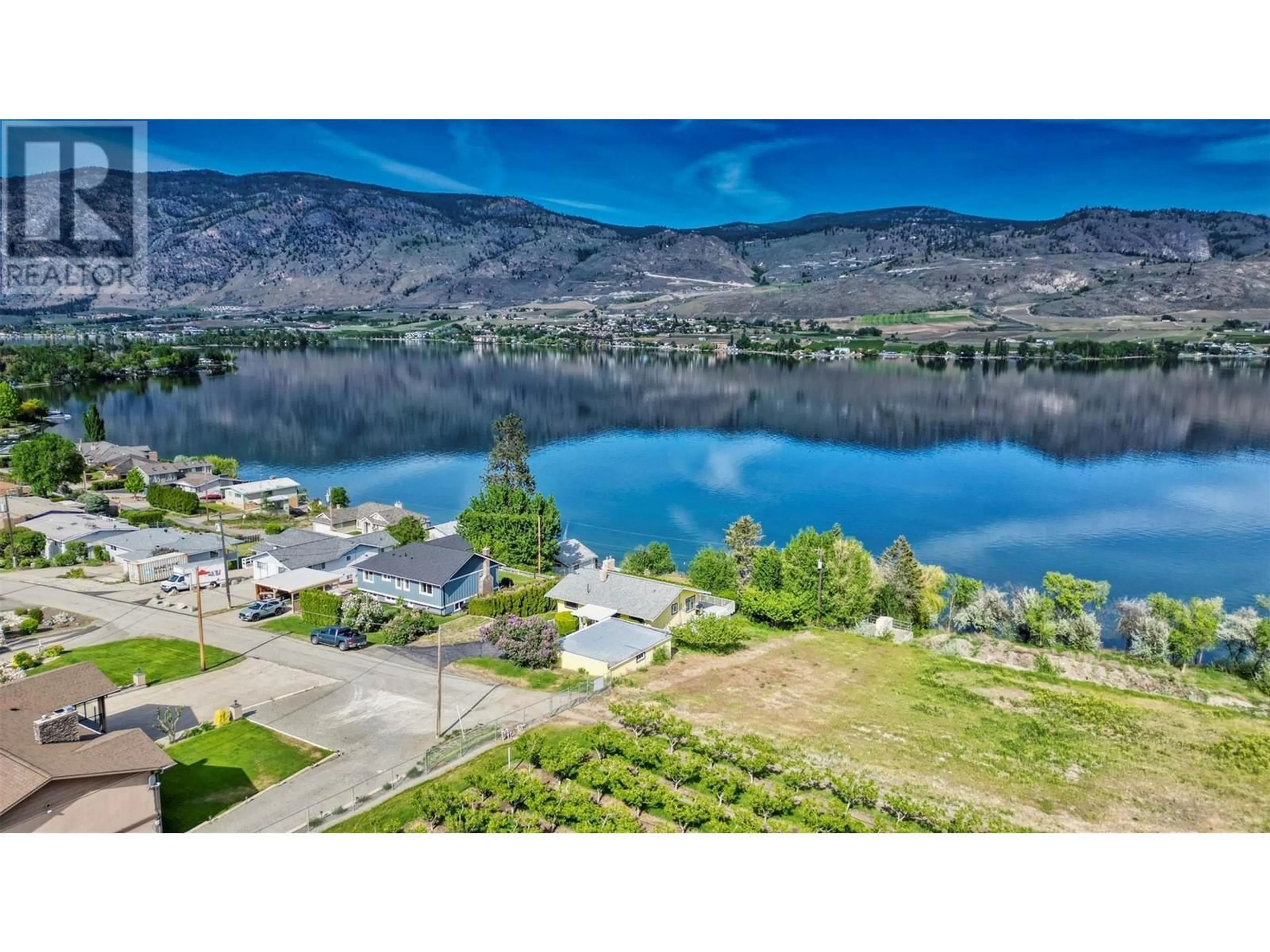 A pic from outside/outdoor area/front of a property/back of a property/a pic from drone, water/lake/river/ocean view for 811 91ST STREET, Osoyoos British Columbia V0H1V1